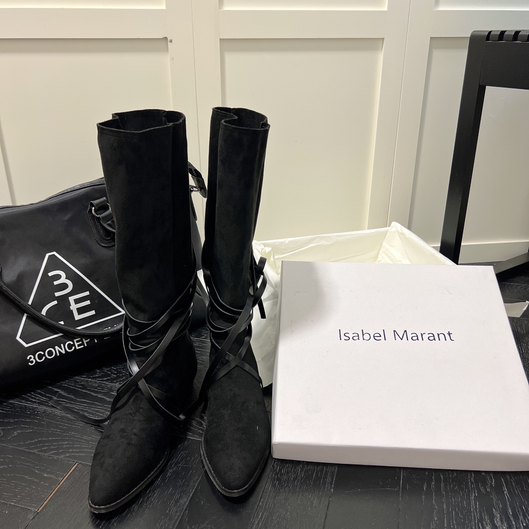 Isabel Marant strips style high knee boots