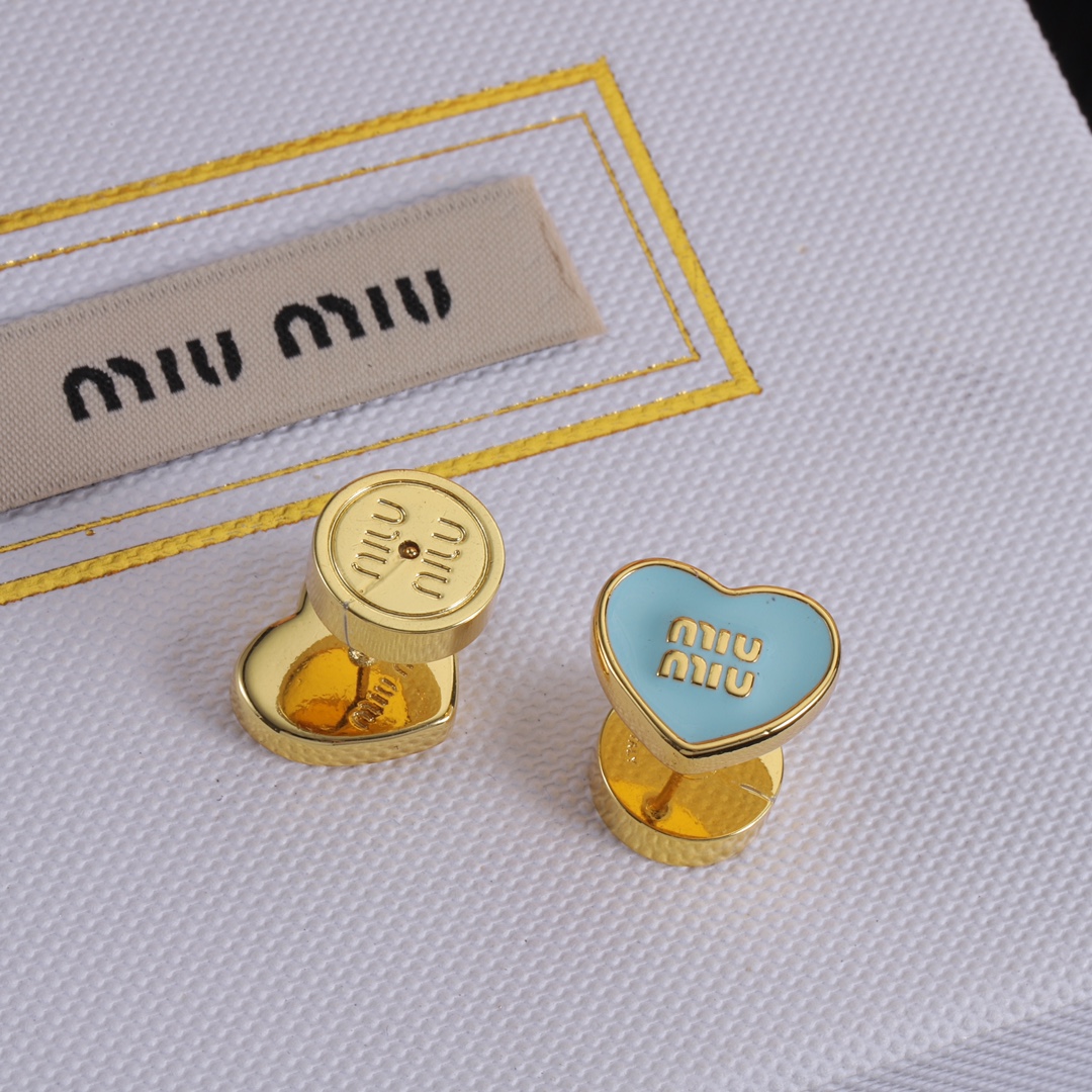 M heart design earrings