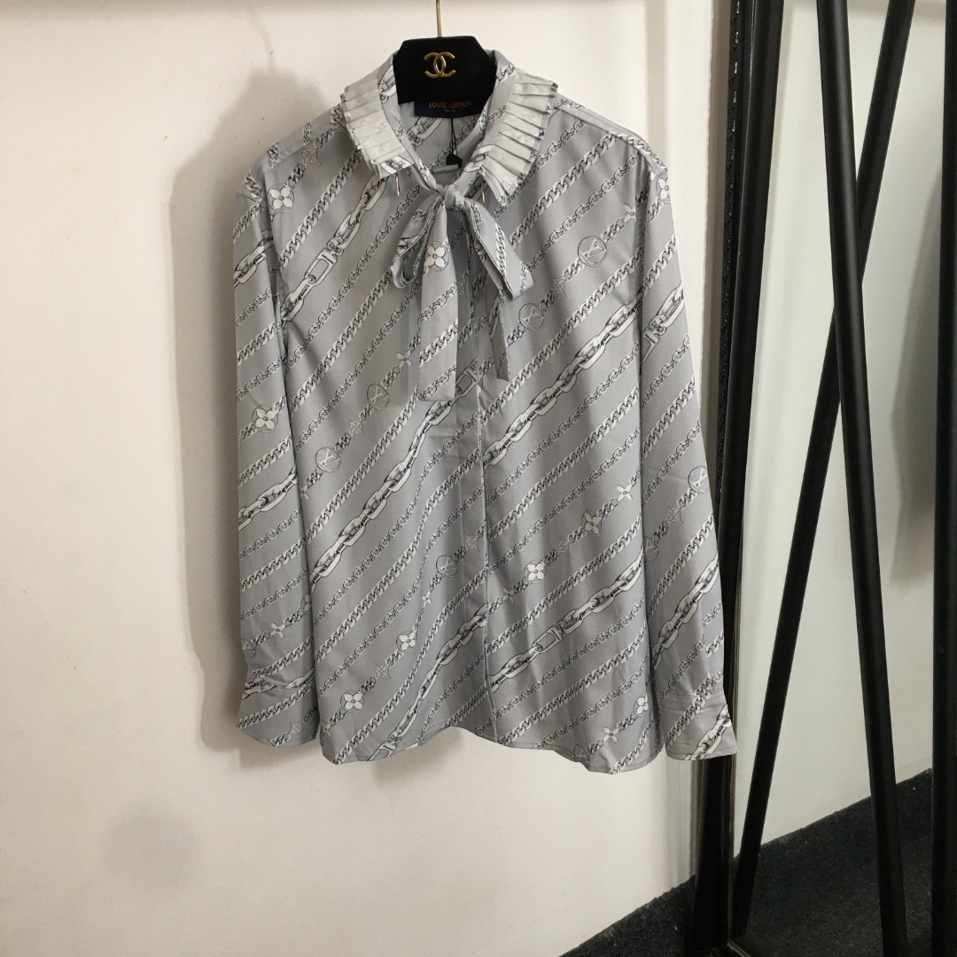 L 2 set Printed long sleeved shirt+side slit pleated skirt