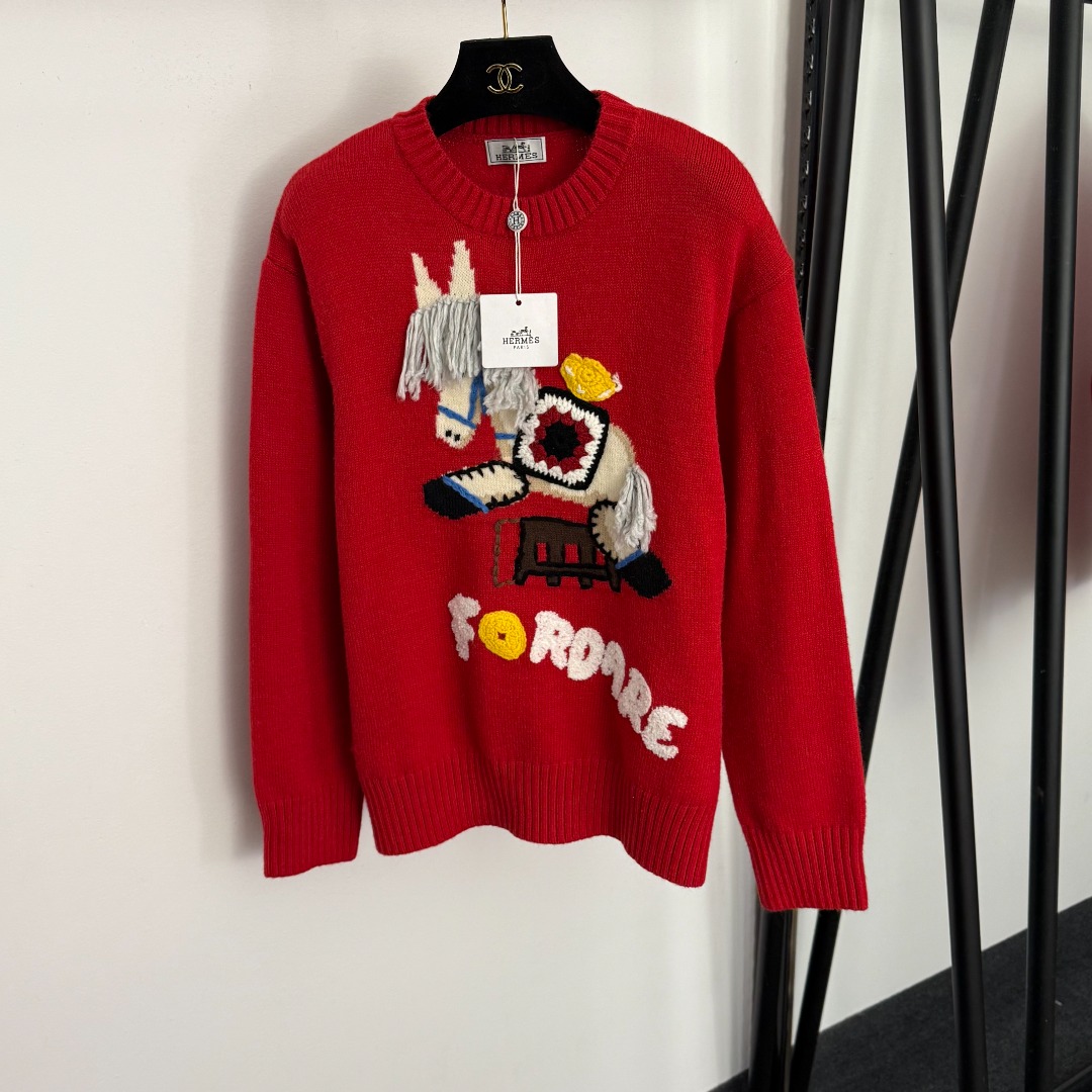 H Long sleeved knitted sweater