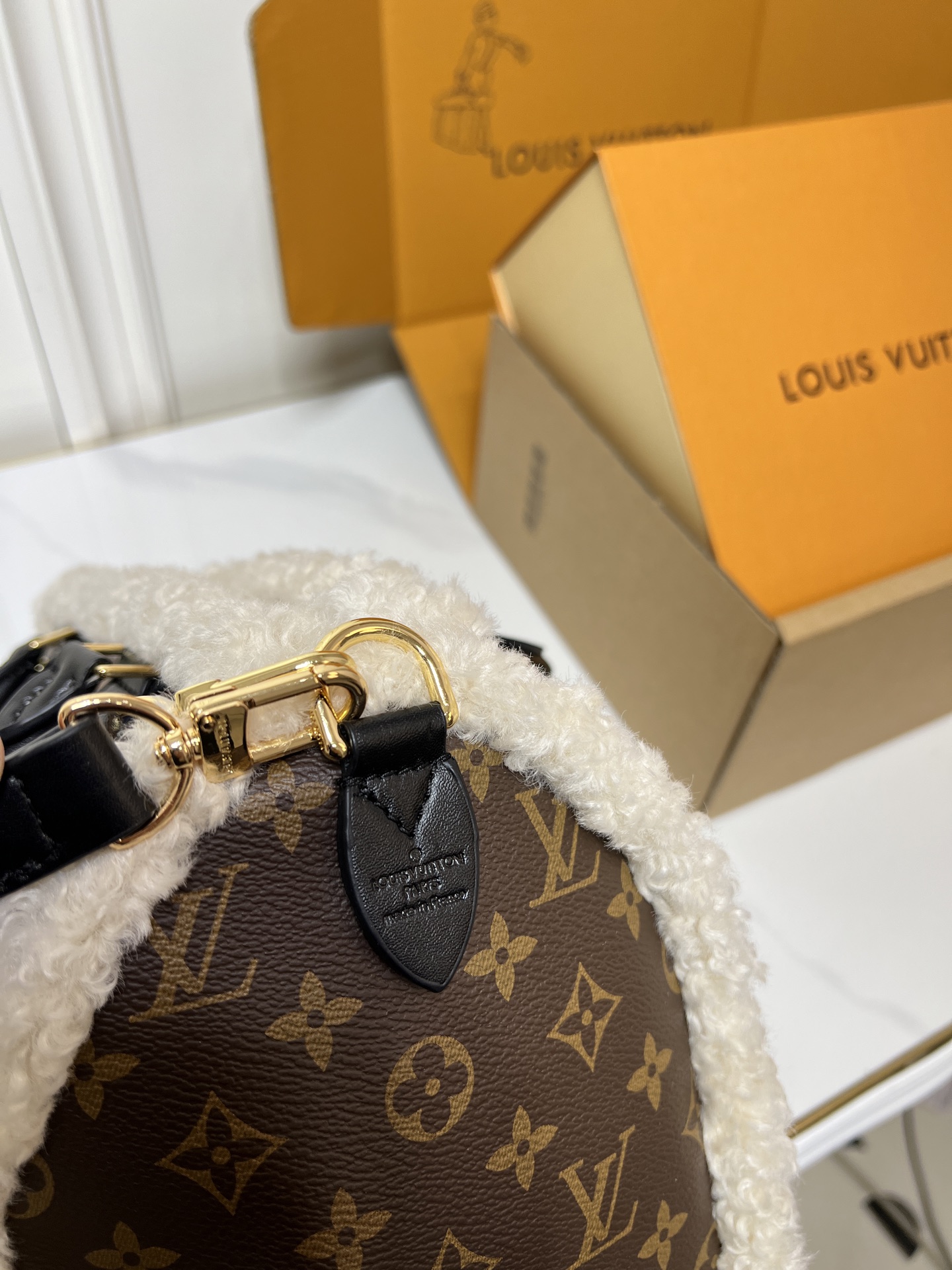 L design Monogram Fuzzy Handbag