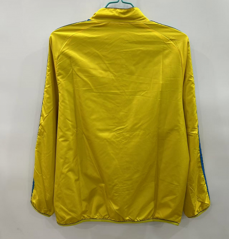 25-26 Real Madrid yellow and blue reversible windbreaker