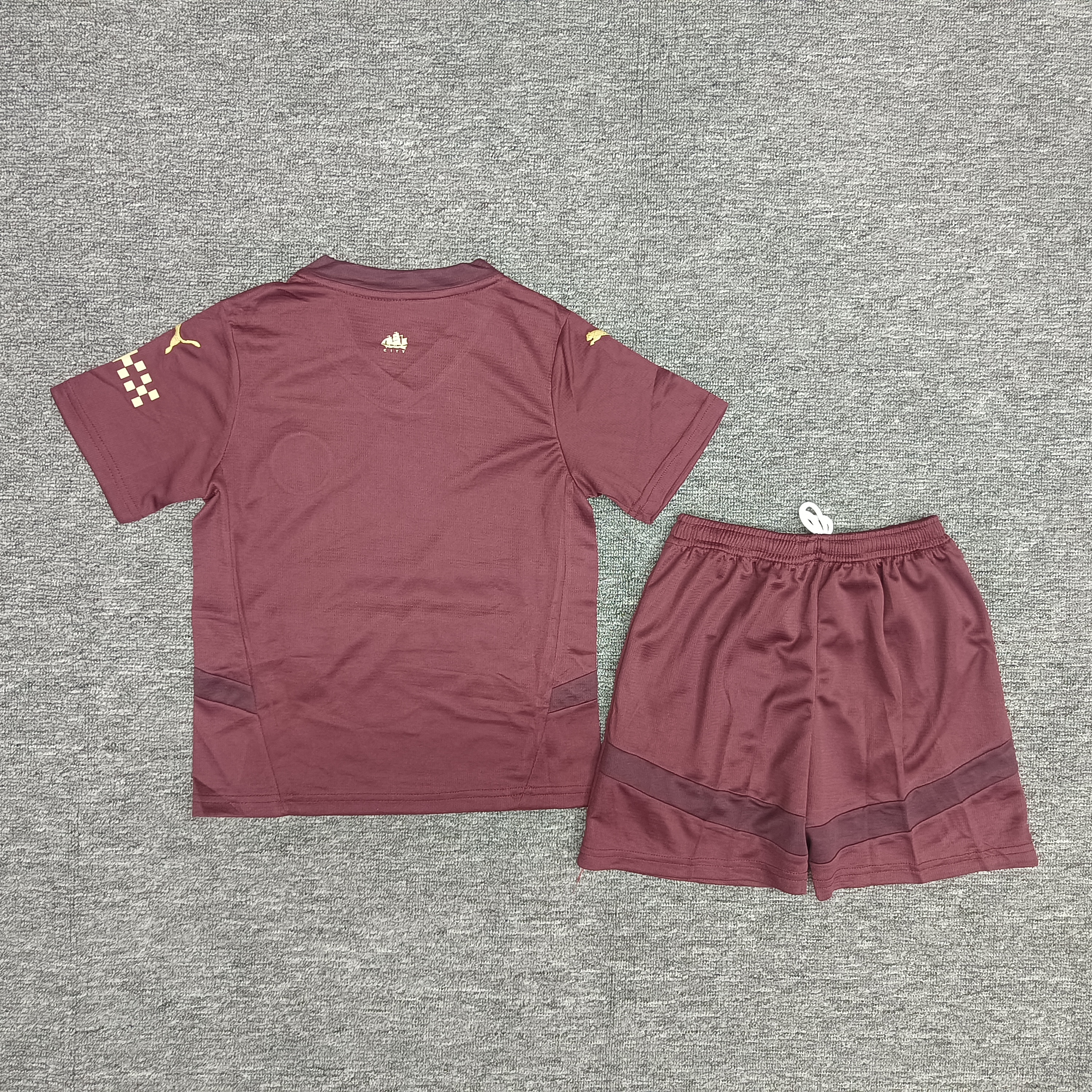 24-25 Manchester City's second away children's football uniform set