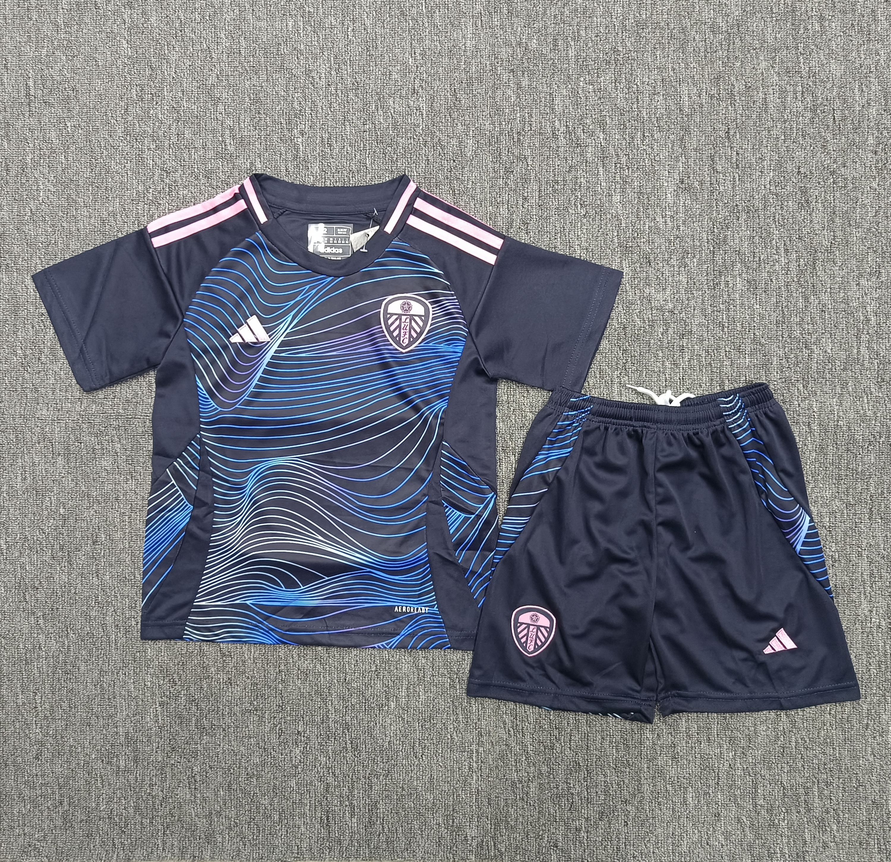 Tottenham Hotspur's second away children's football uniform set for 24-25