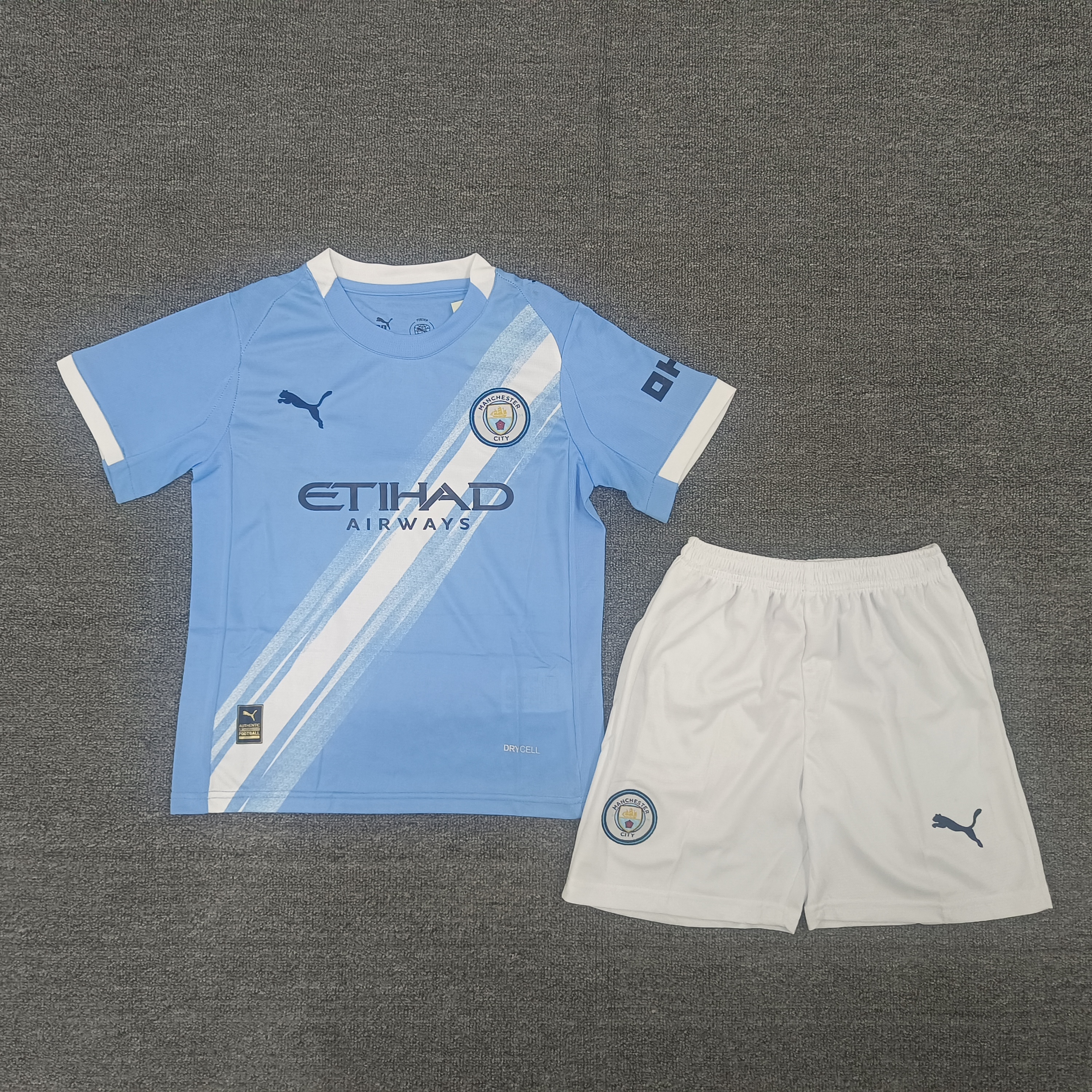 Manchester City home 16-28 yards children's football uniform set