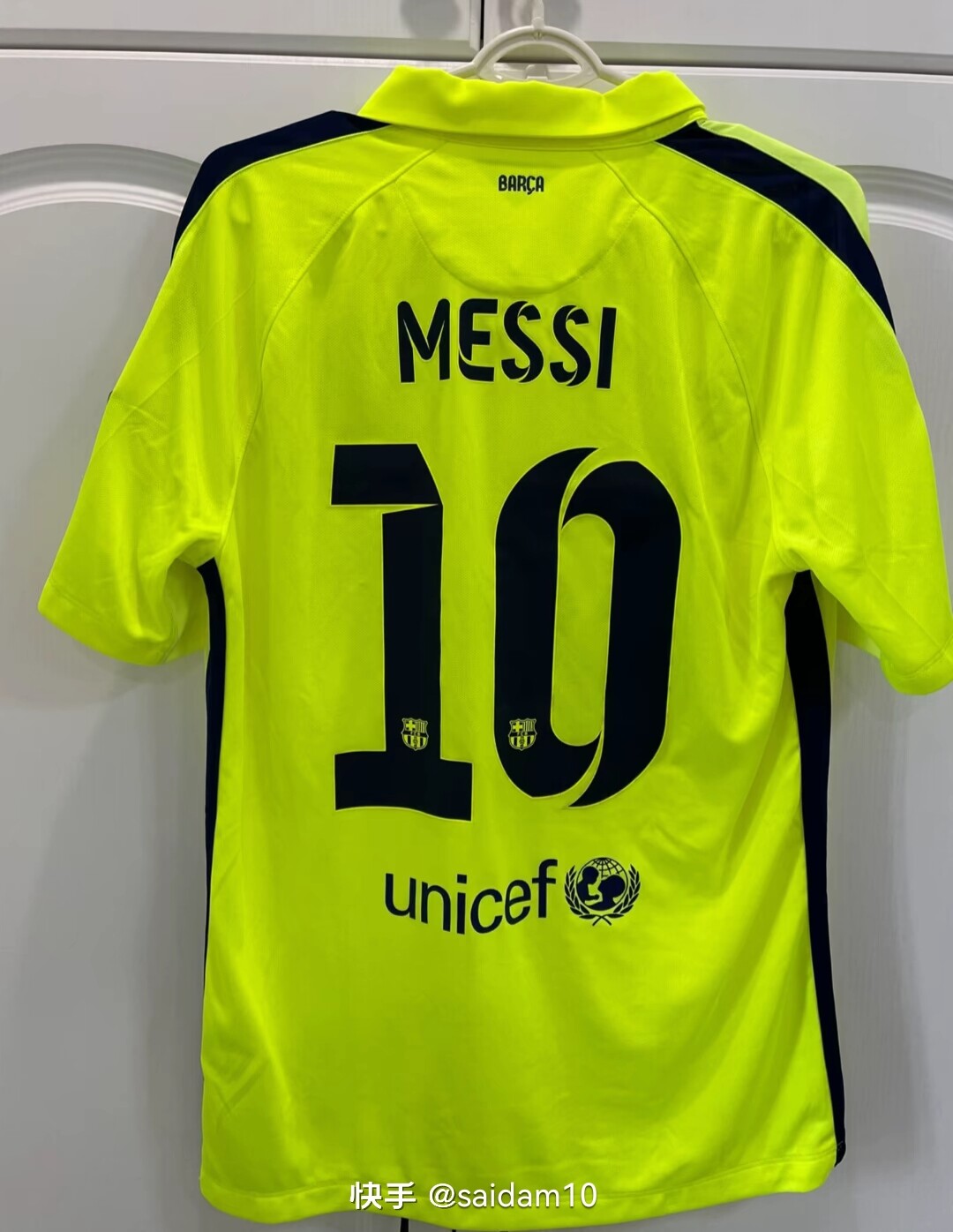 In the 2014-15 Barcelona away game, Messi wore the jersey