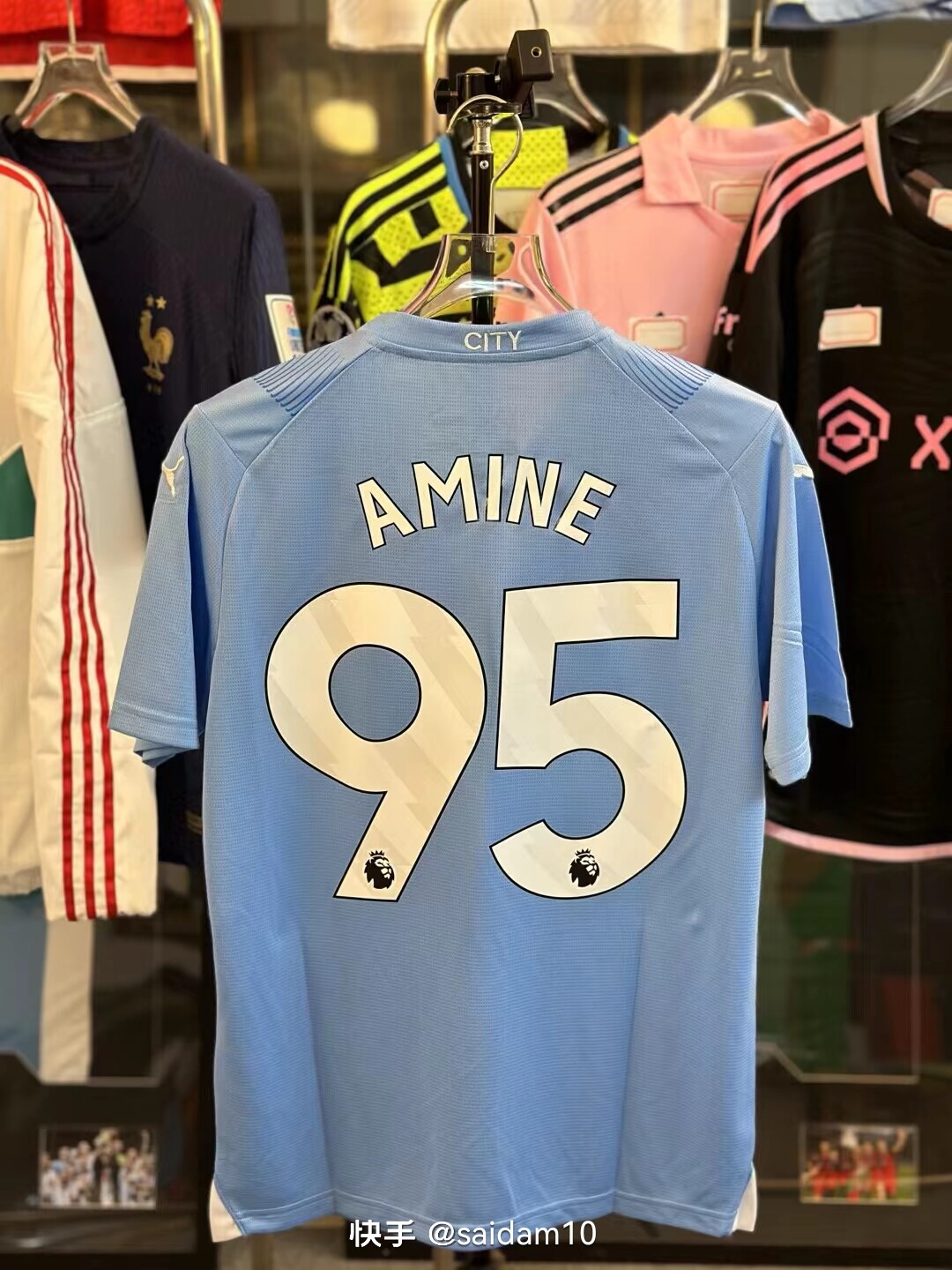 The home jersey number of Manchester City in the 2023-2024 season is 95
