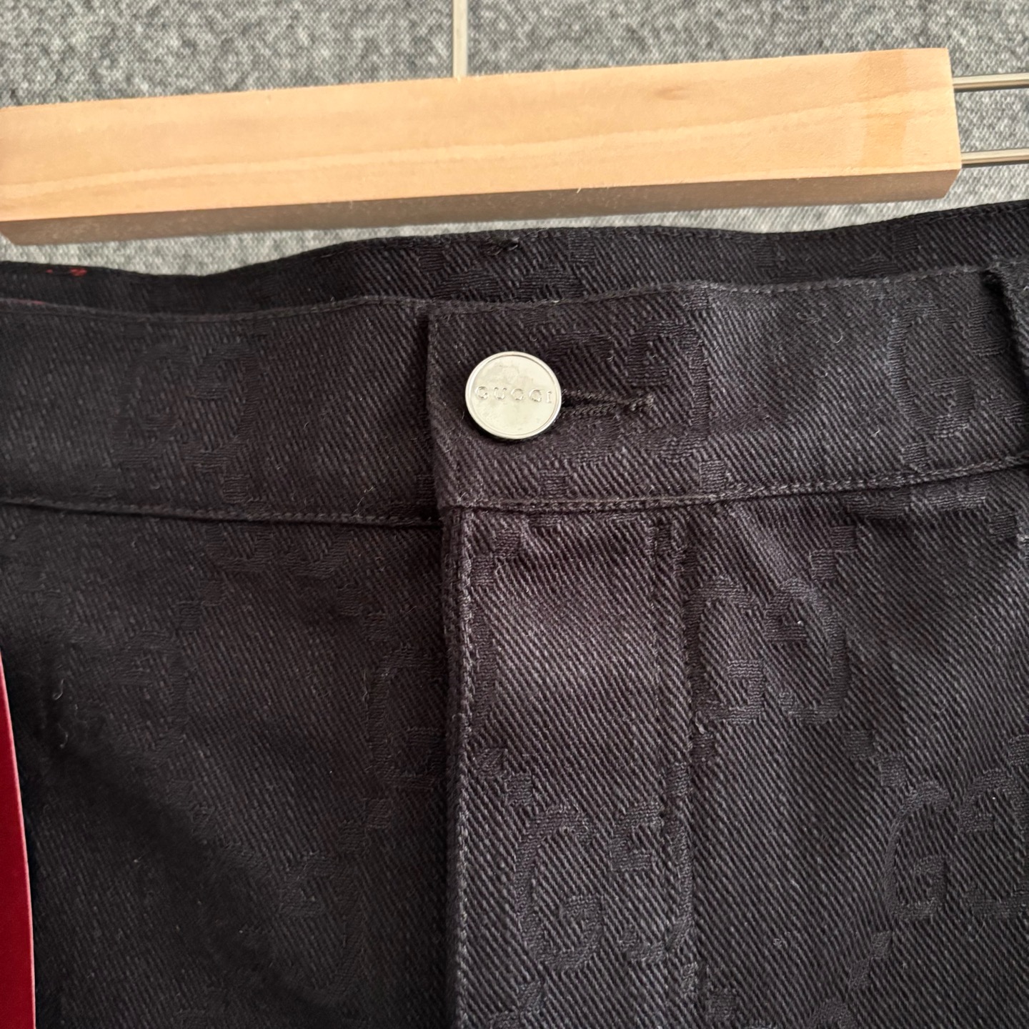 Black embossed denim trousers