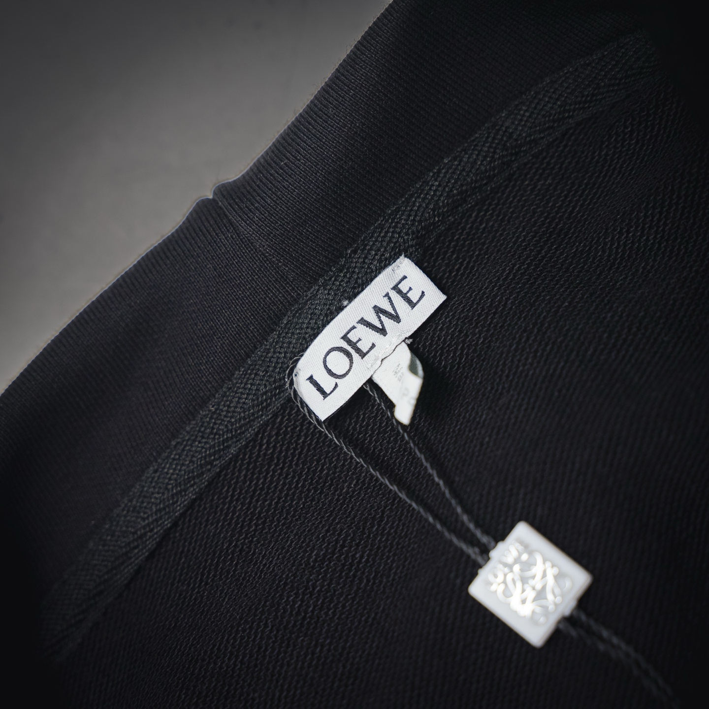 Embossed Chest Logo with Leather Pocket Hoodies