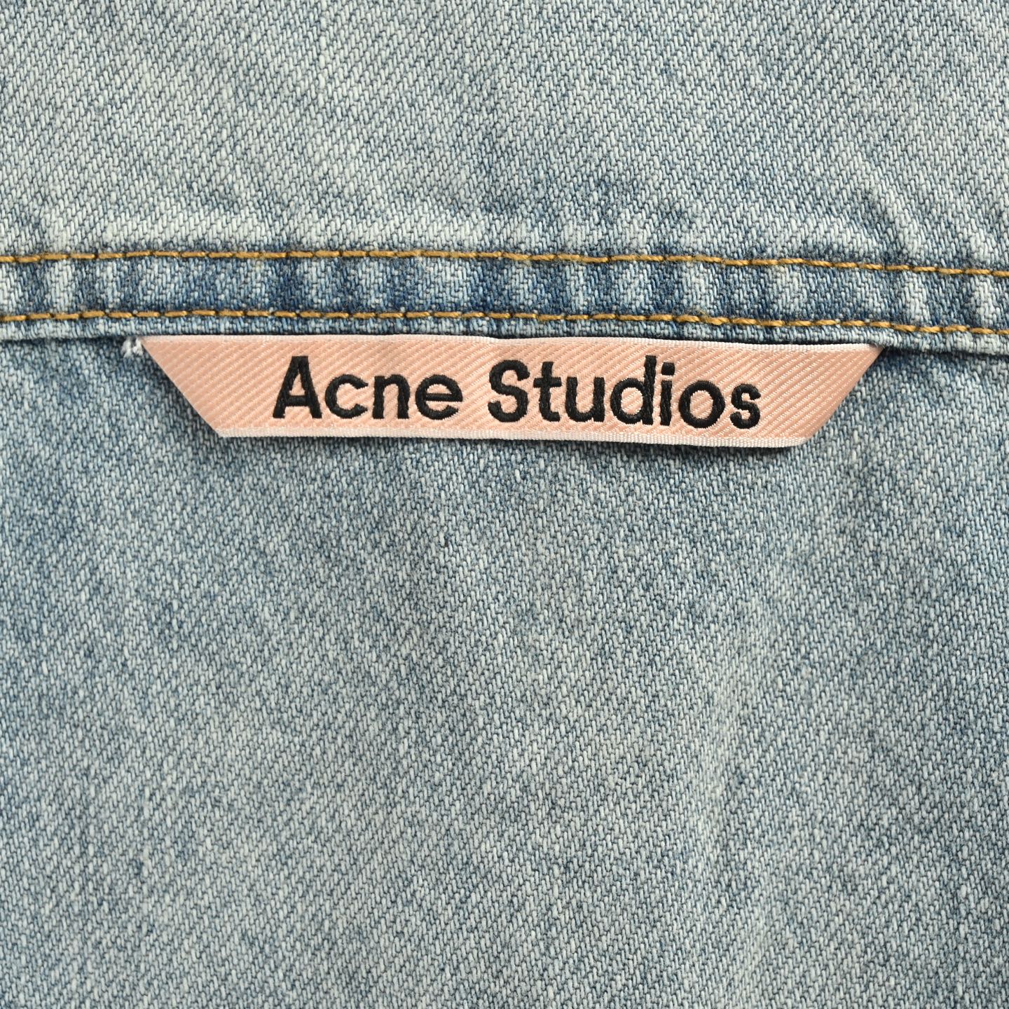 Ink-splashed button-down denim shirt