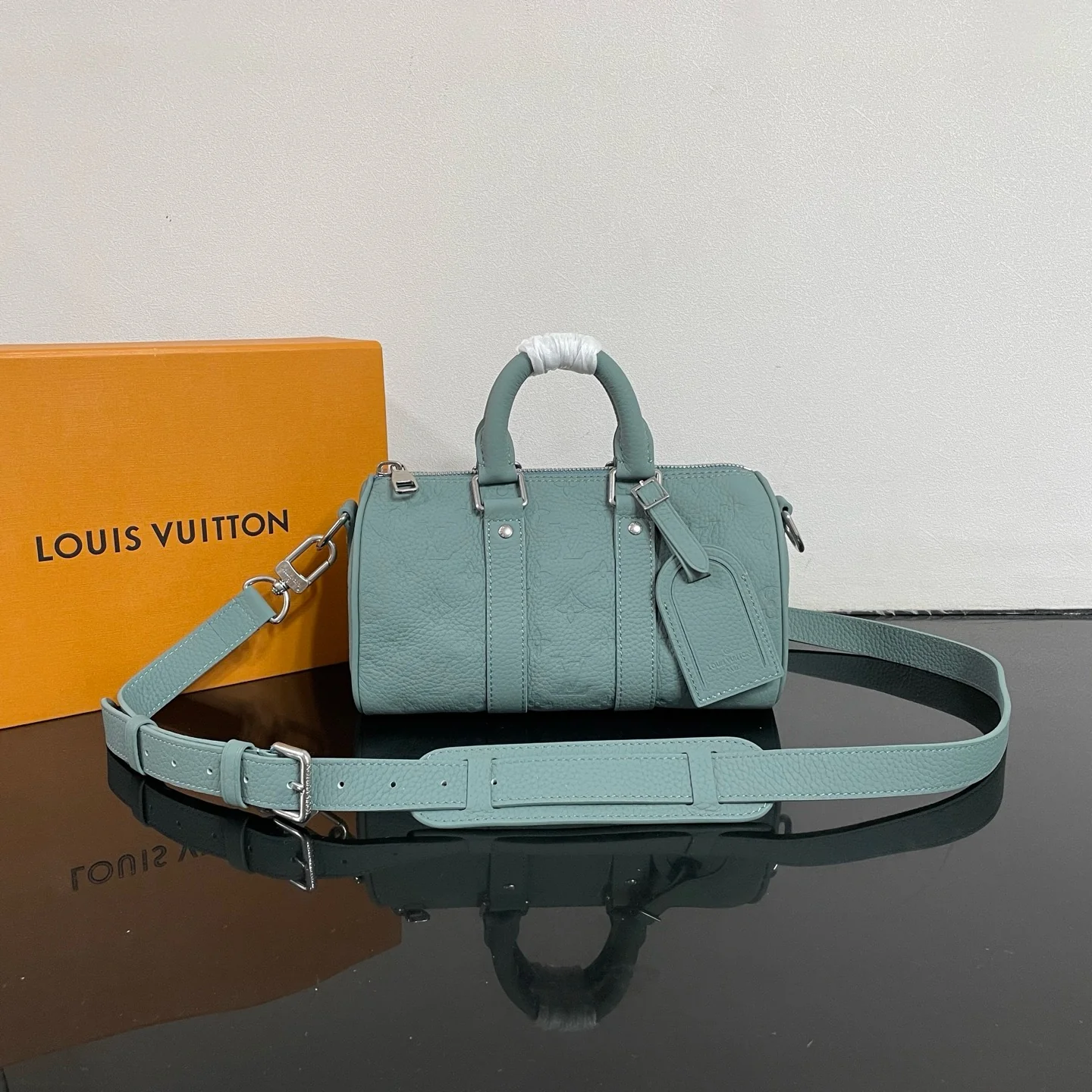 Embossed cowhide leather bag