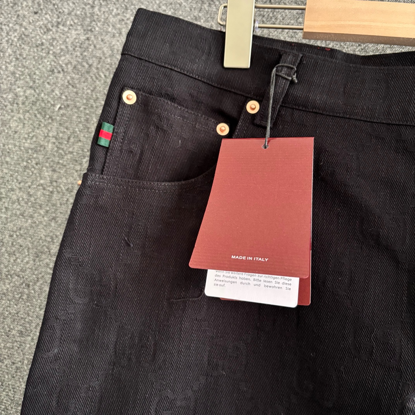 Black embossed denim trousers