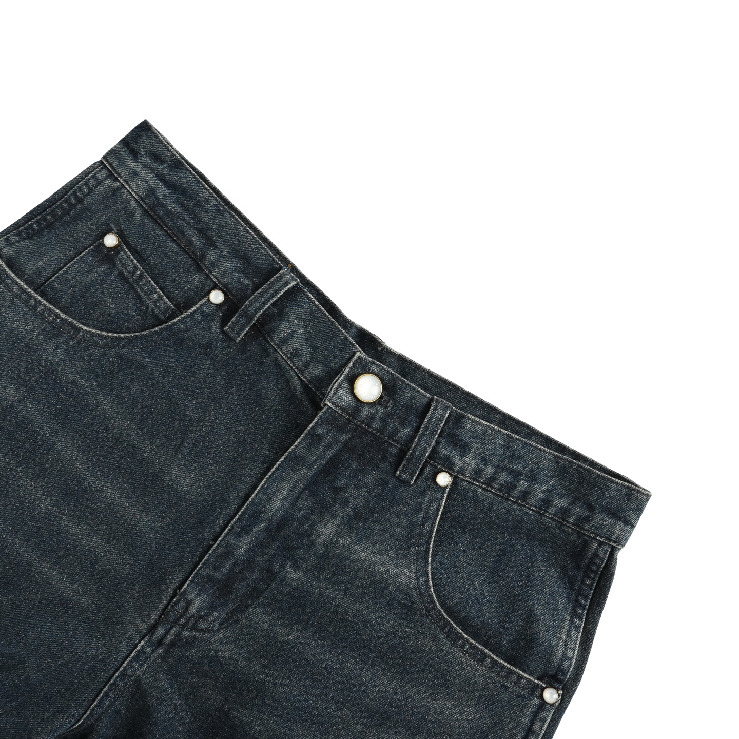 Denim shorts with embossed monogram pattern