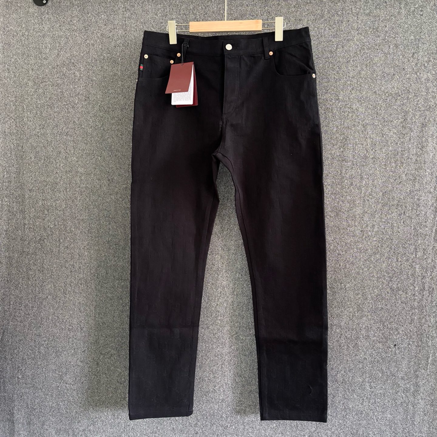 Black embossed denim trousers