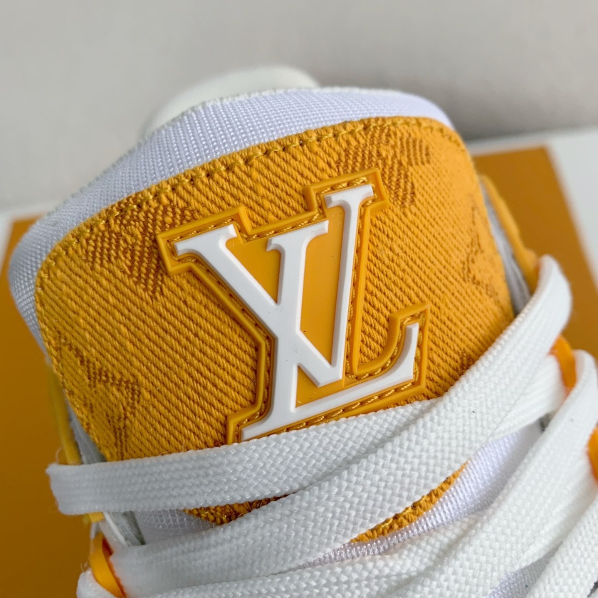 Yellow denim and white sneakers