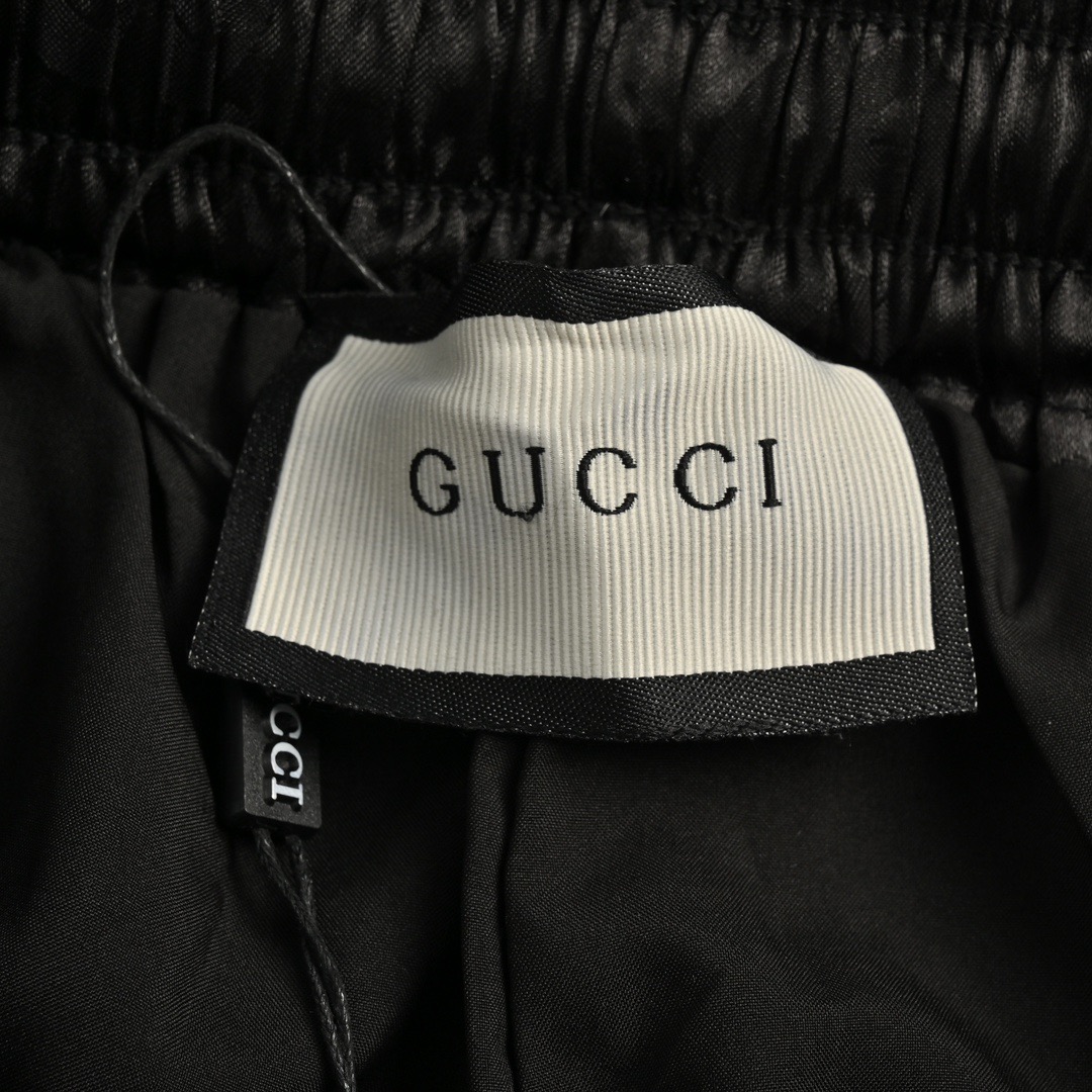 Dark pattern beach shorts