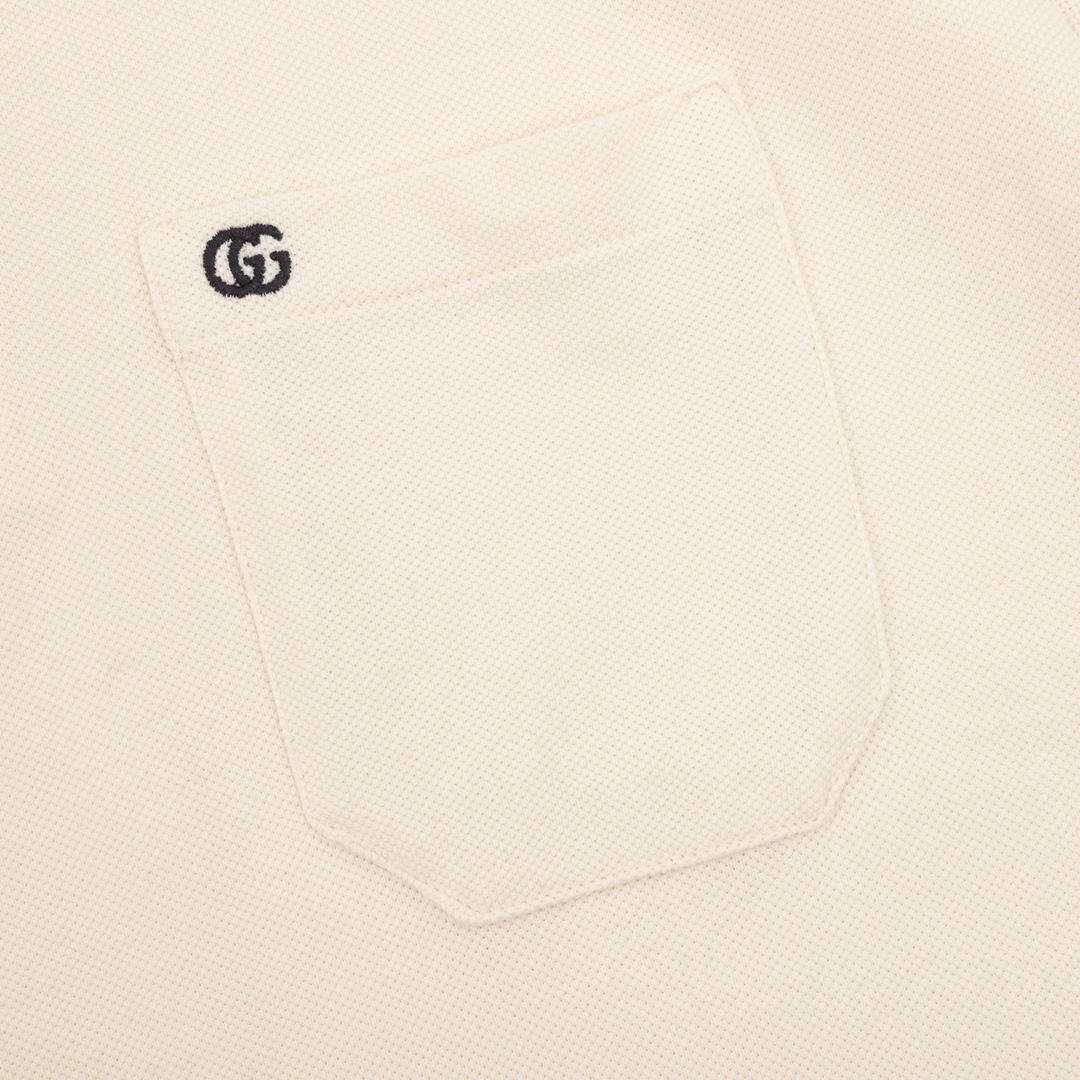 Polo shirt with embroidered logo on pocket