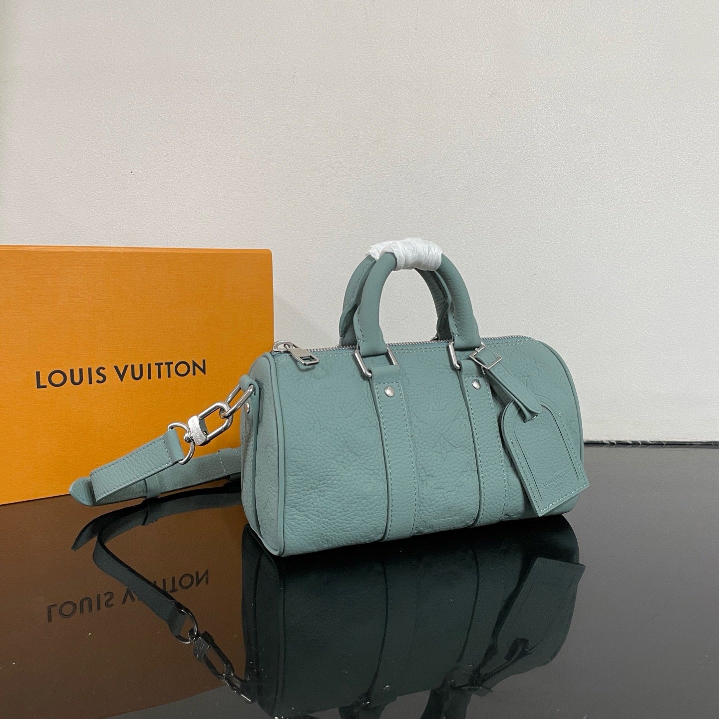 Embossed cowhide leather bag