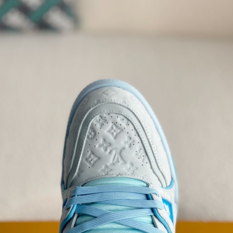 Blue embroidered sneakers