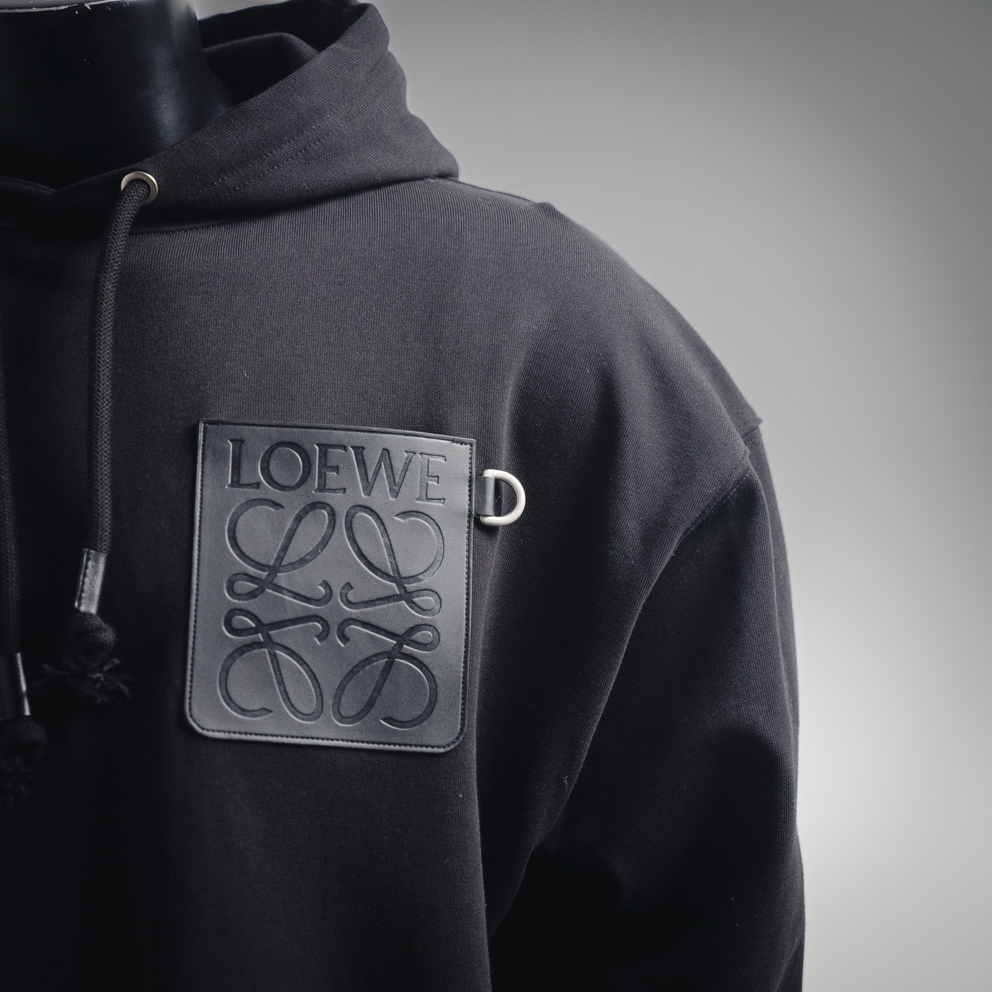 Embossed Chest Logo with Leather Pocket Hoodies
