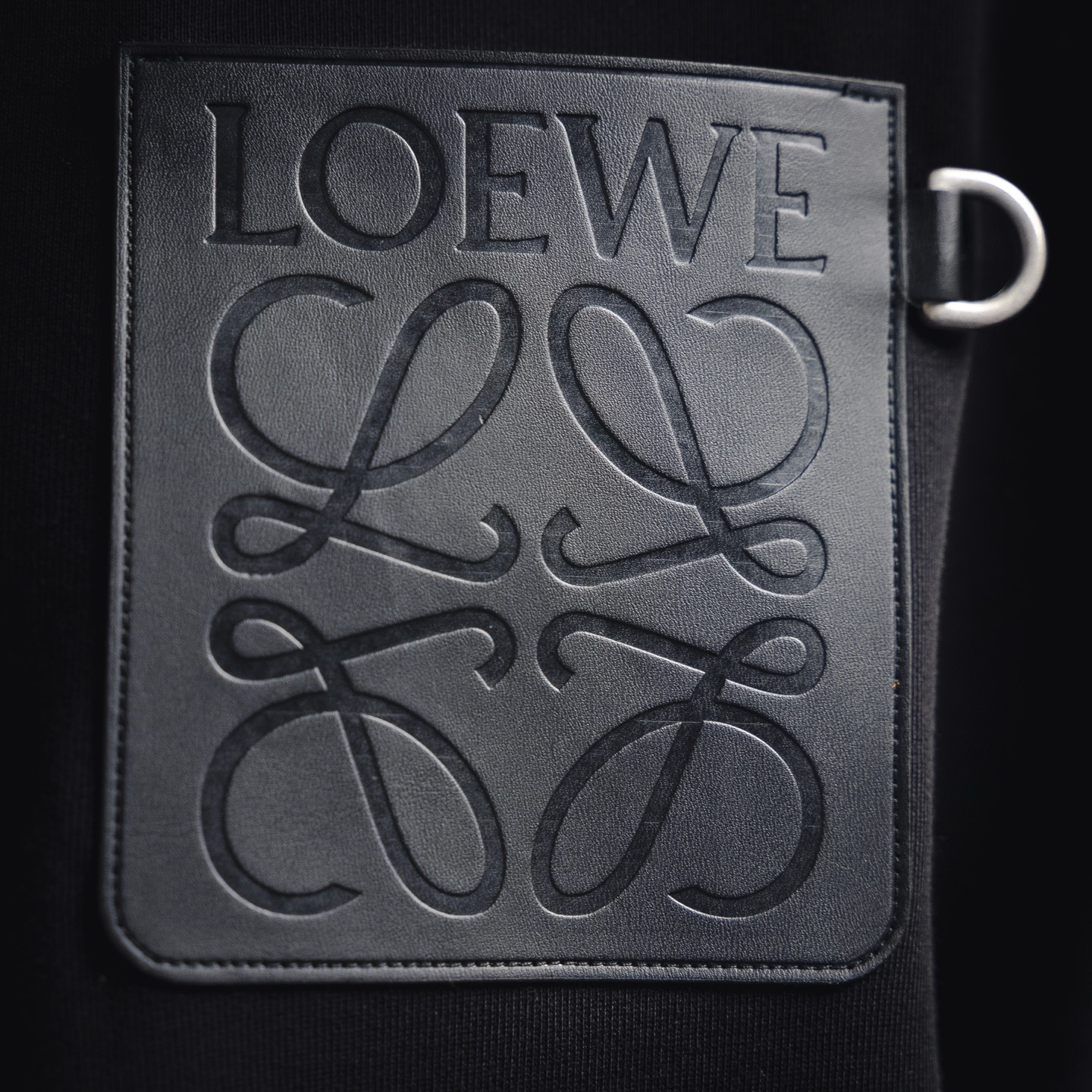 Embossed Chest Logo with Leather Pocket Hoodies