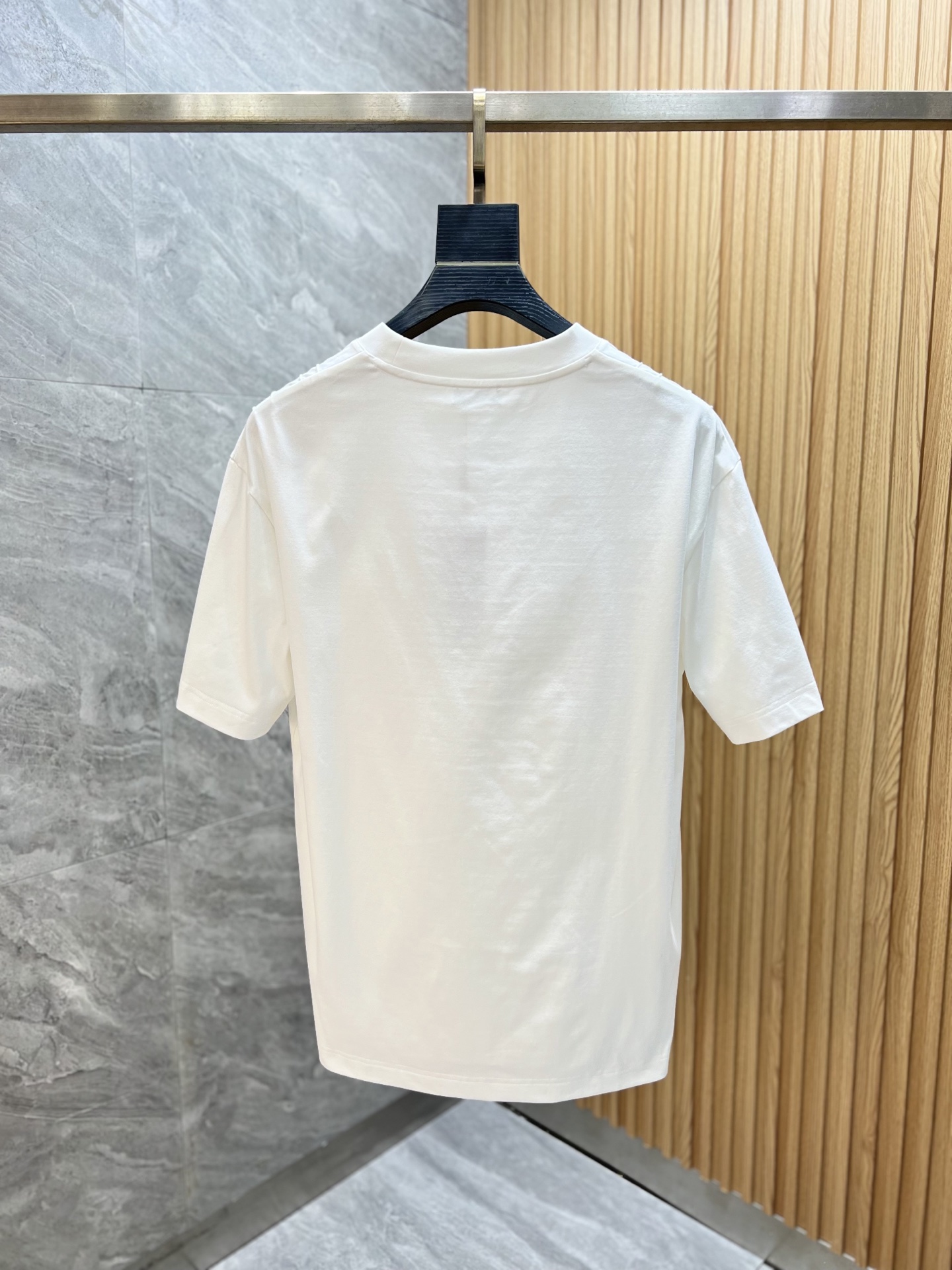Washed and worn embroidered T-shirt