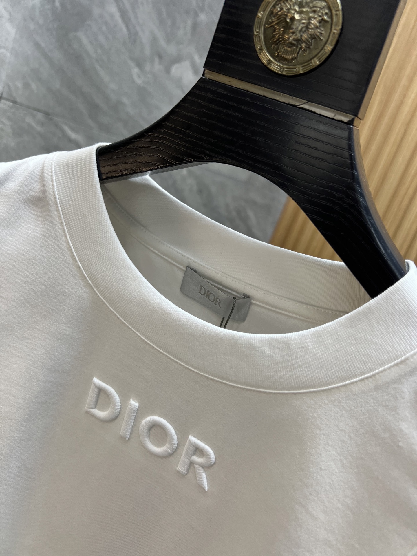 Washed and worn embroidered T-shirt
