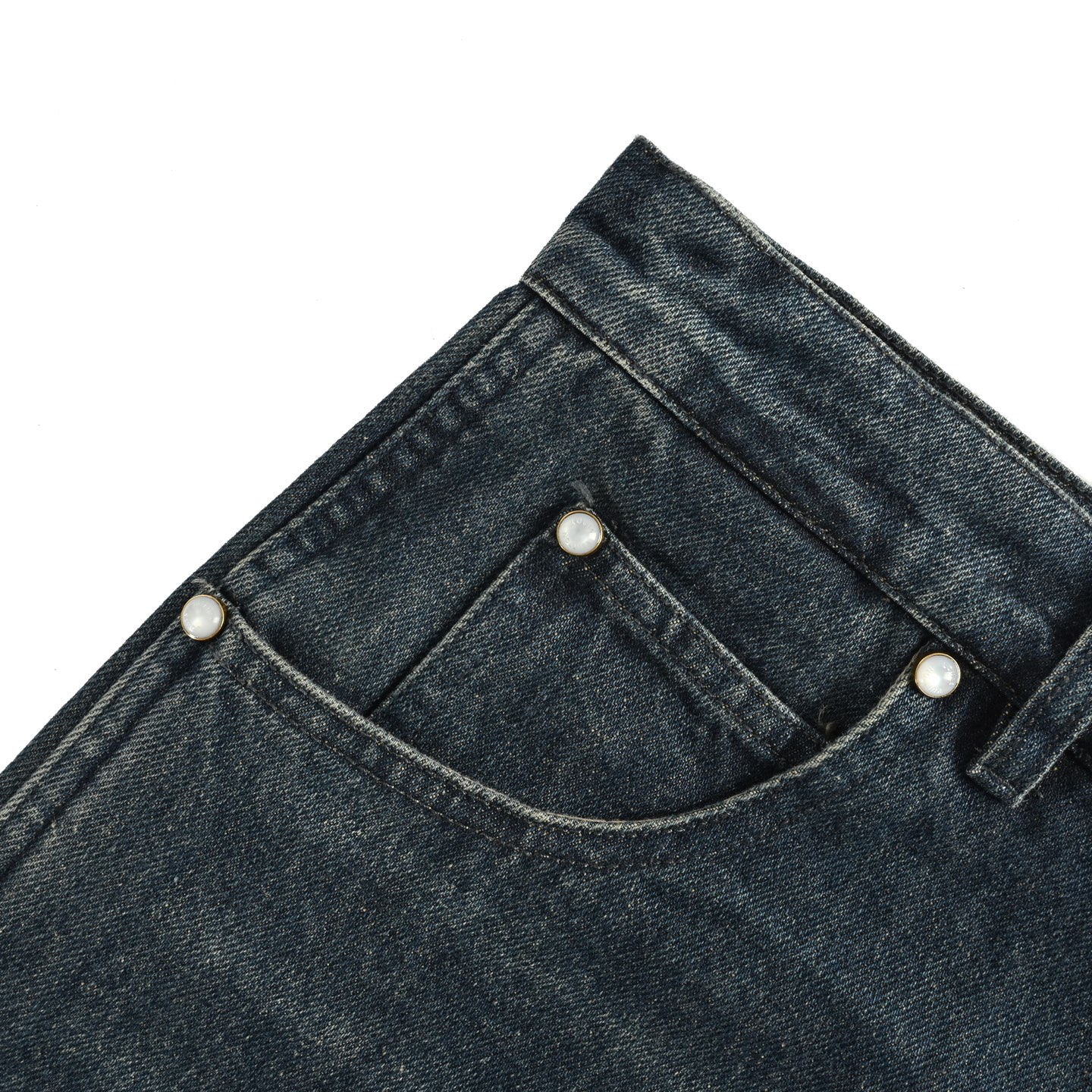 Denim shorts with embossed monogram pattern