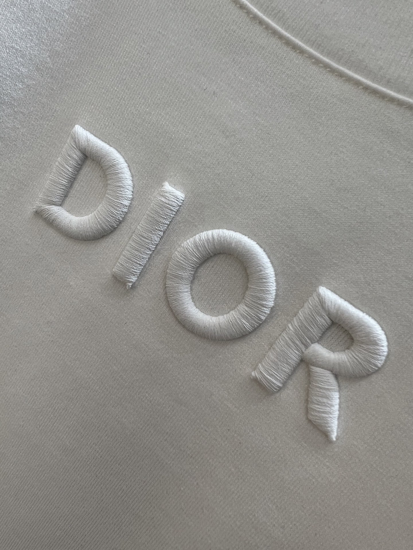 Washed and worn embroidered T-shirt