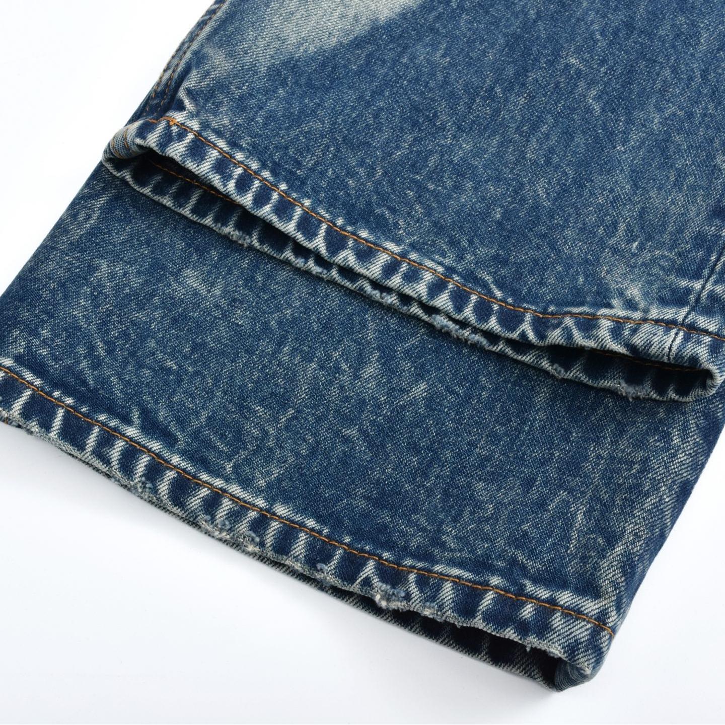 Abnormally faded leather label jeans