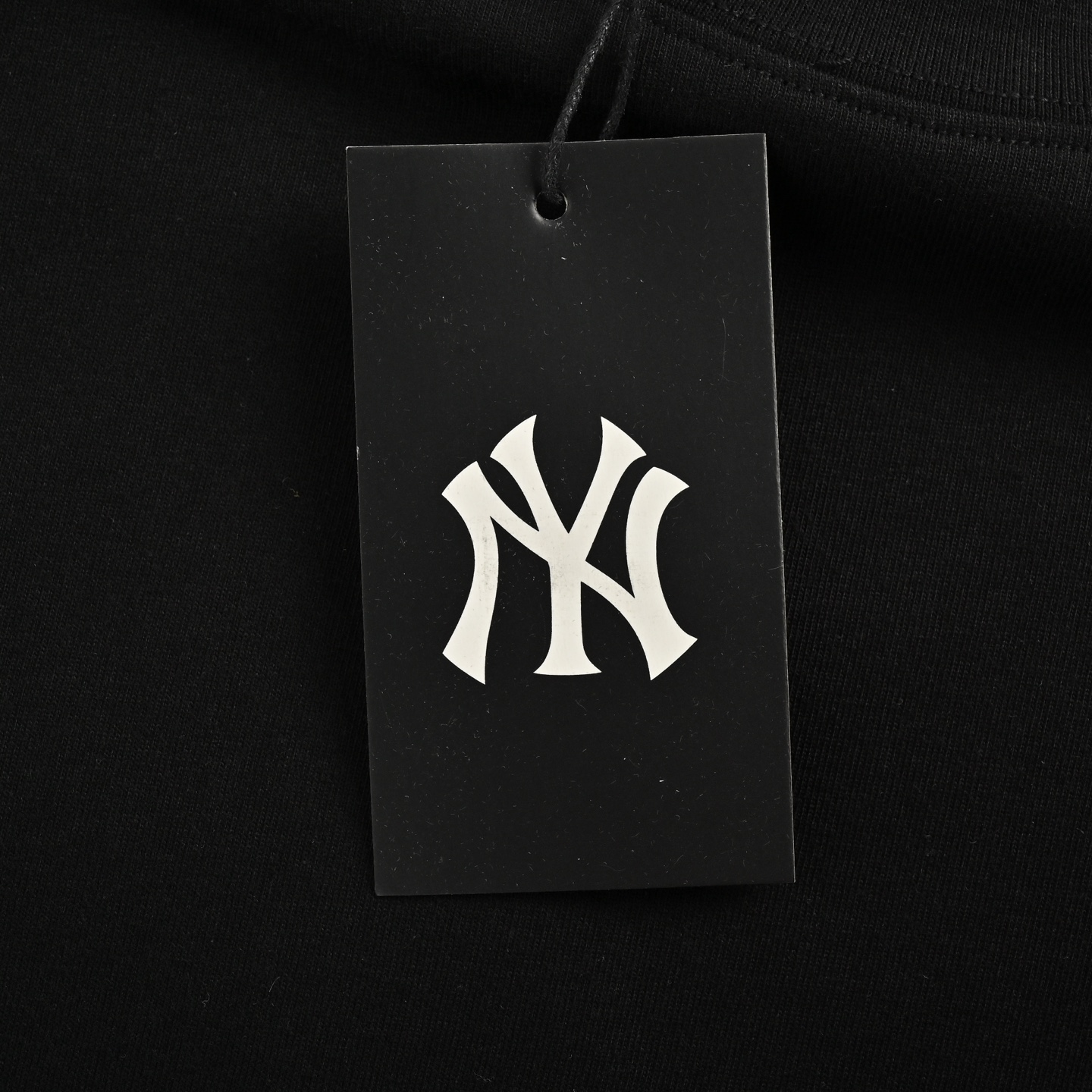 Back embroidered subtle pattern T-shirt