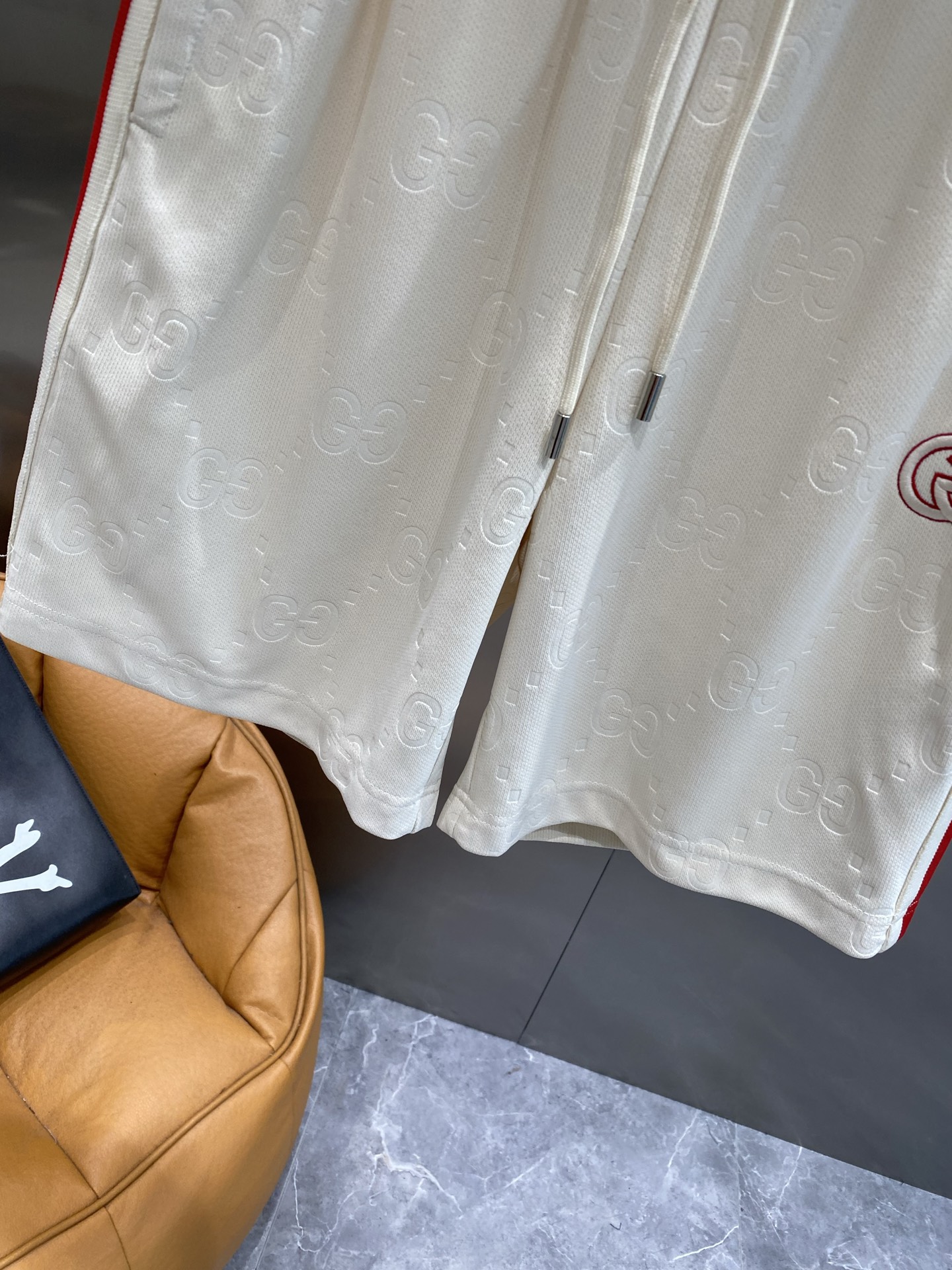 Red and white striped side panel shorts