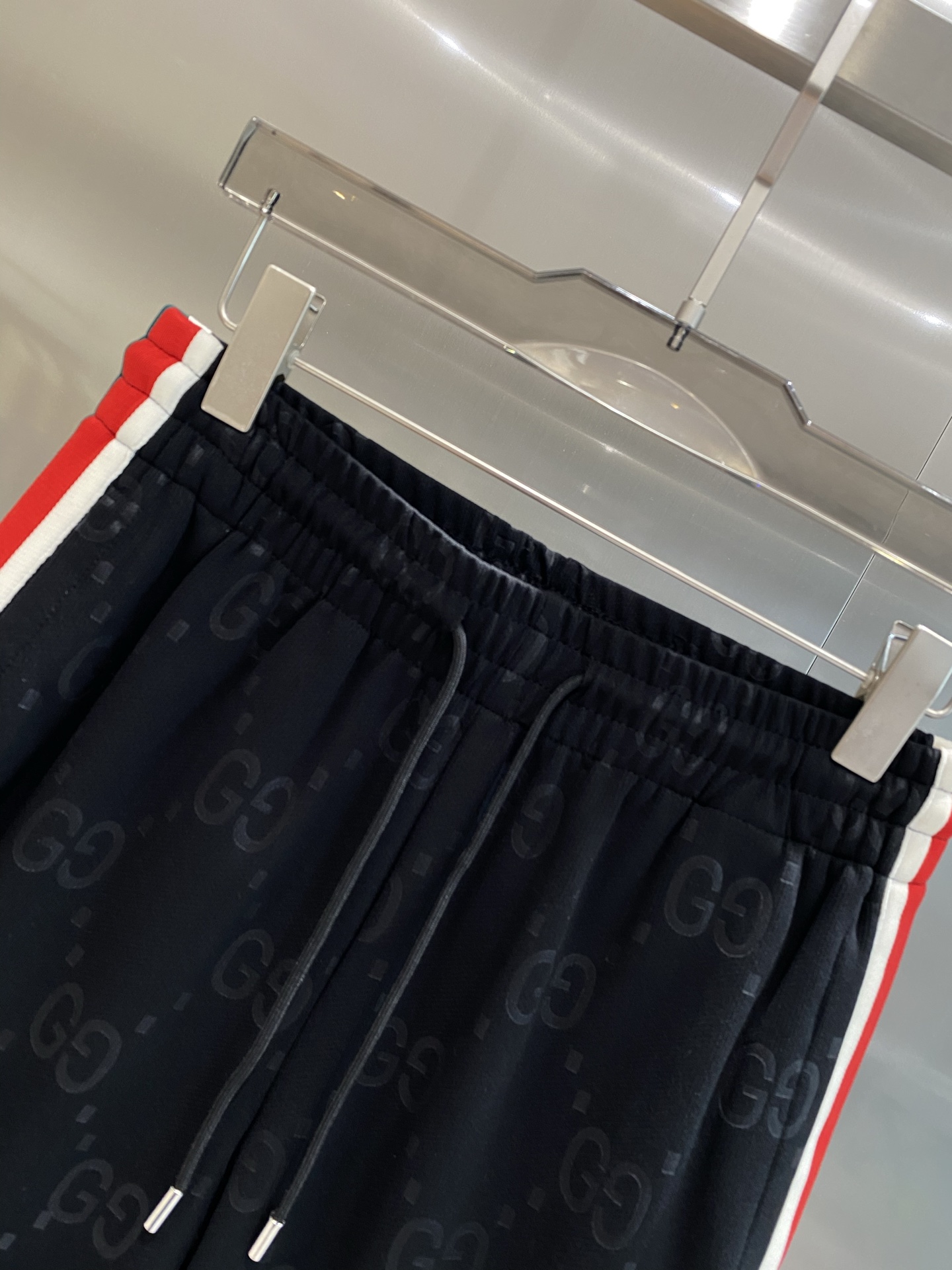 Red and white striped side panel shorts