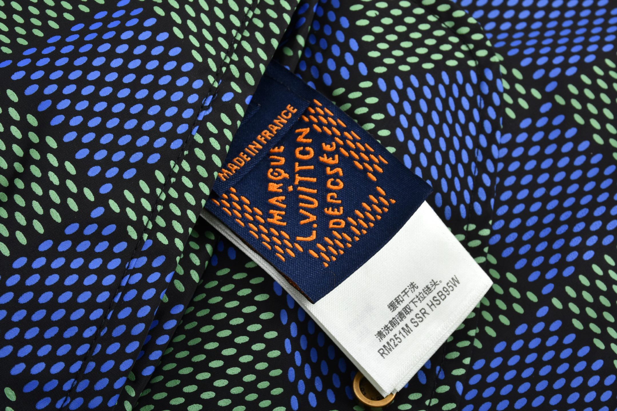 Checkerboard reversible zip-up jacket