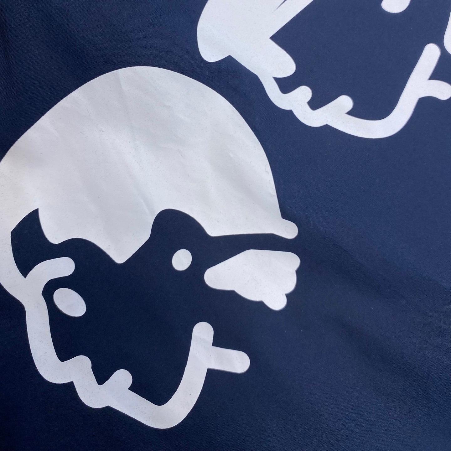 Blue shirt with co-branded signature print