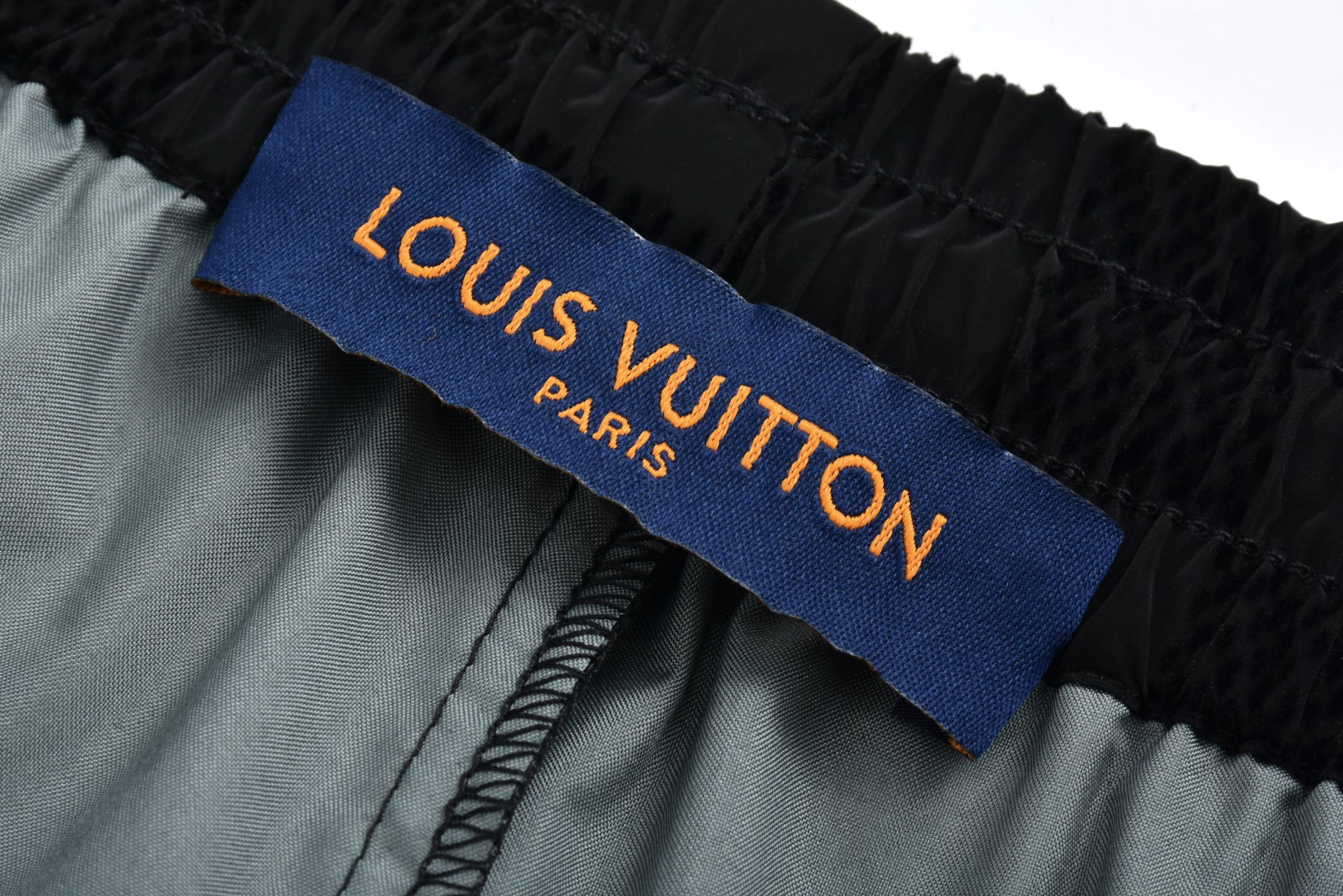 25SS Checkered Letter Flocking Jacquard Cuffed Pants