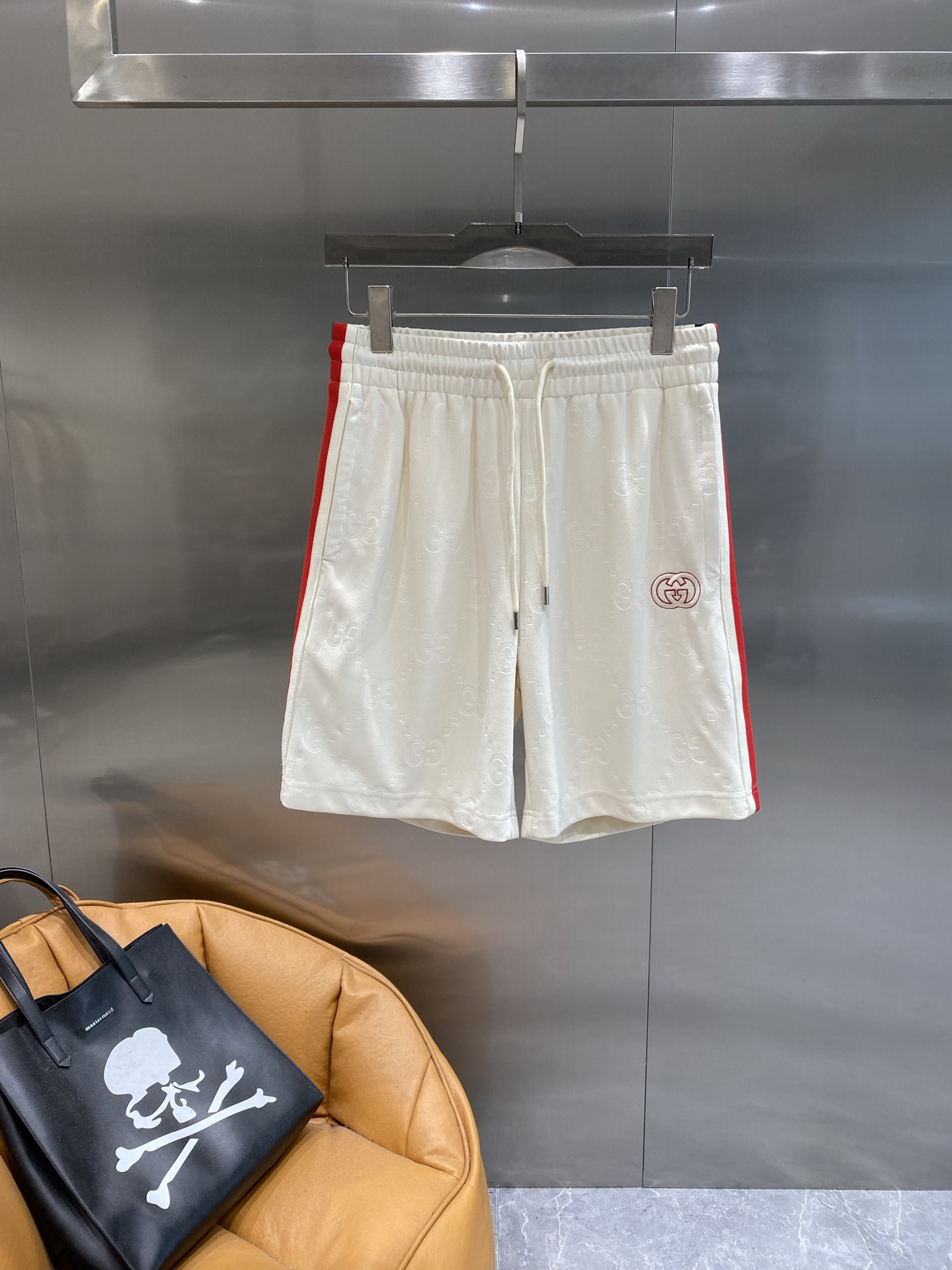 Red and white striped side panel shorts