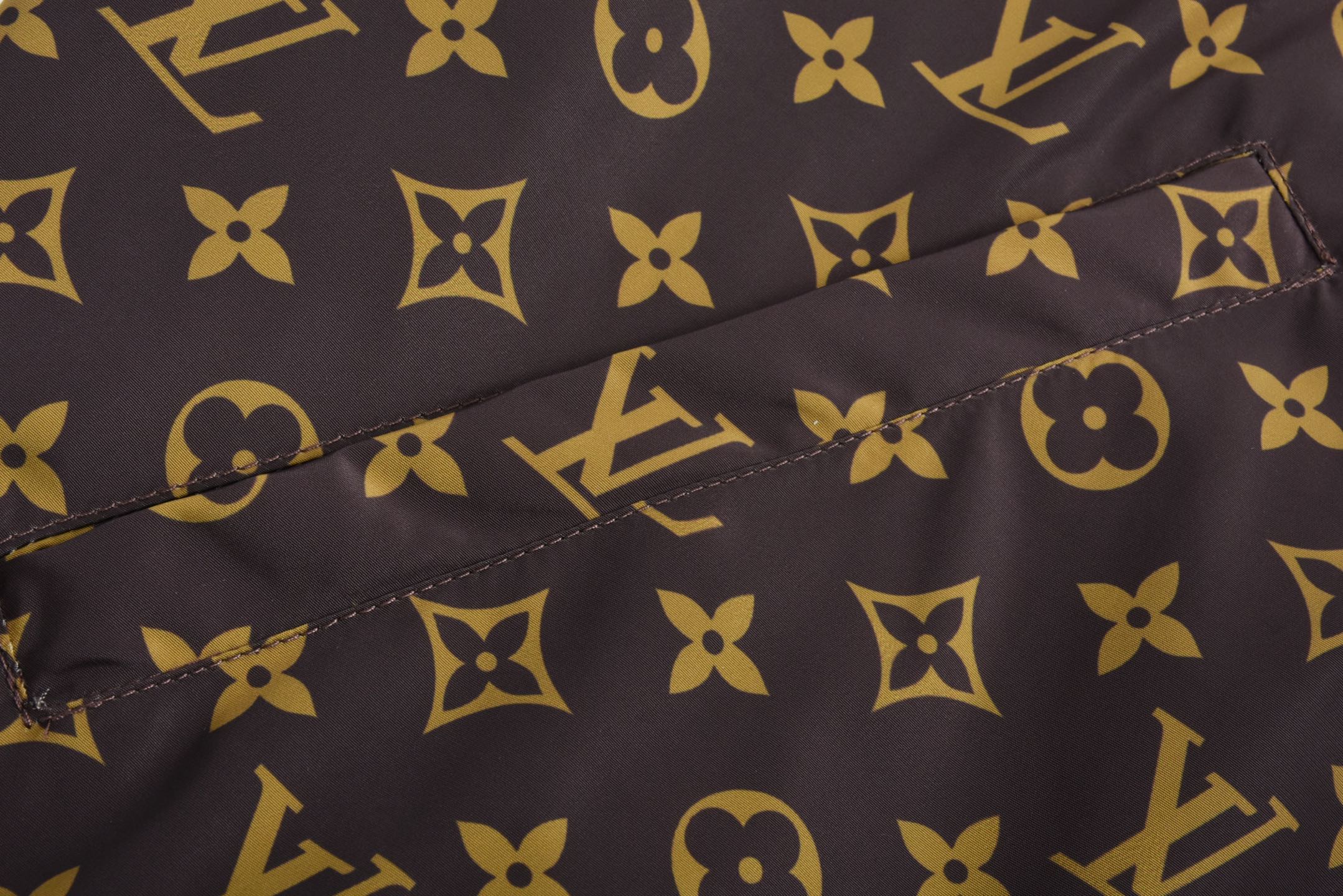 Checkerboard reversible zip-up jacket