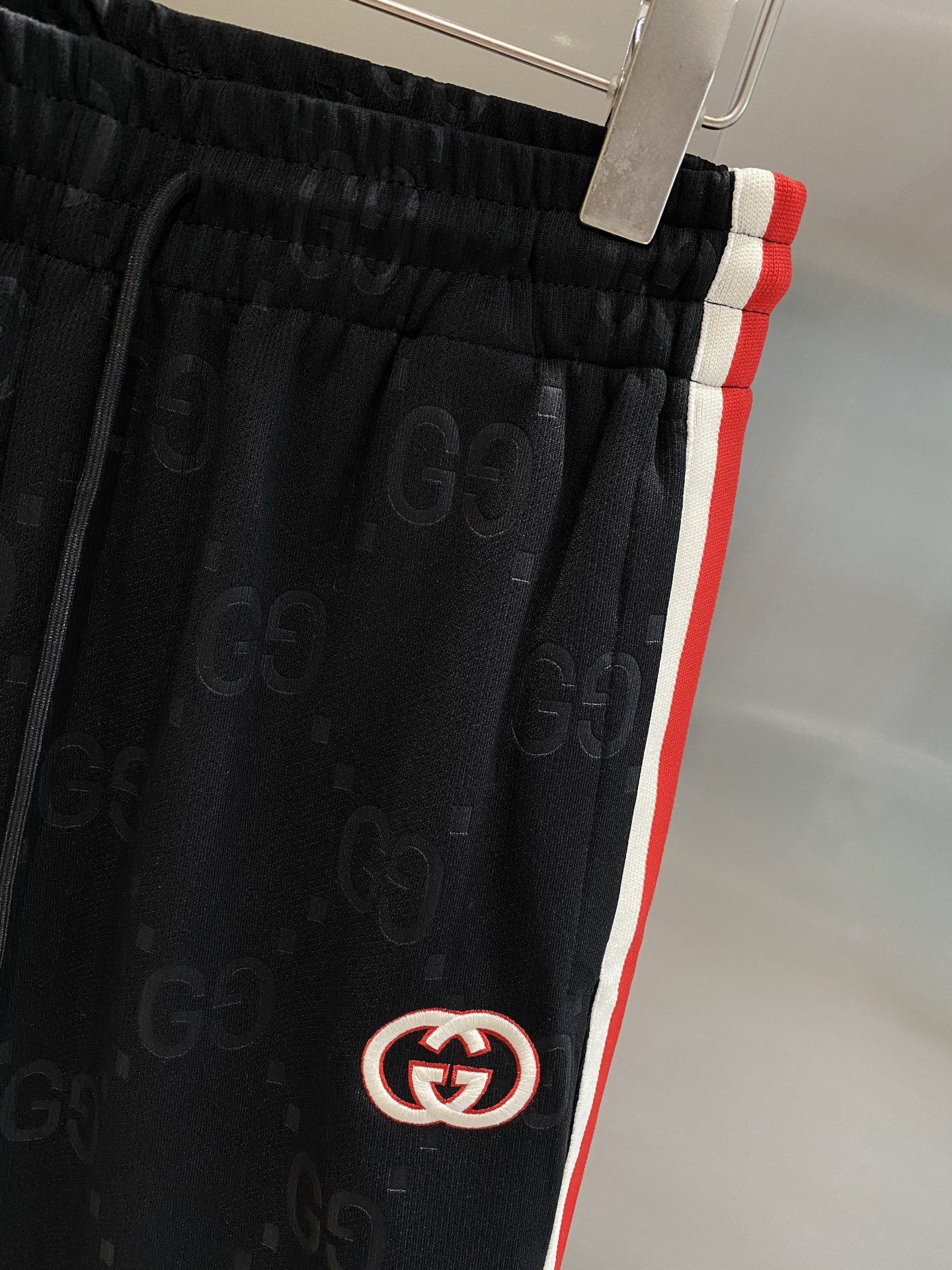 Red and white striped side panel shorts