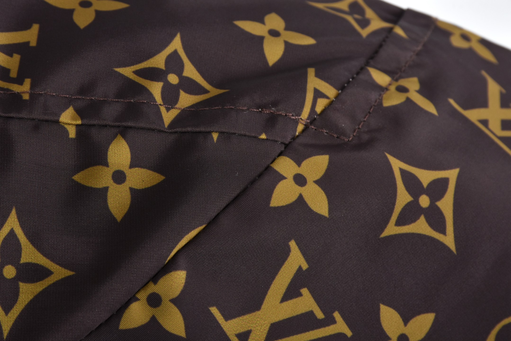 Checkerboard reversible zip-up jacket