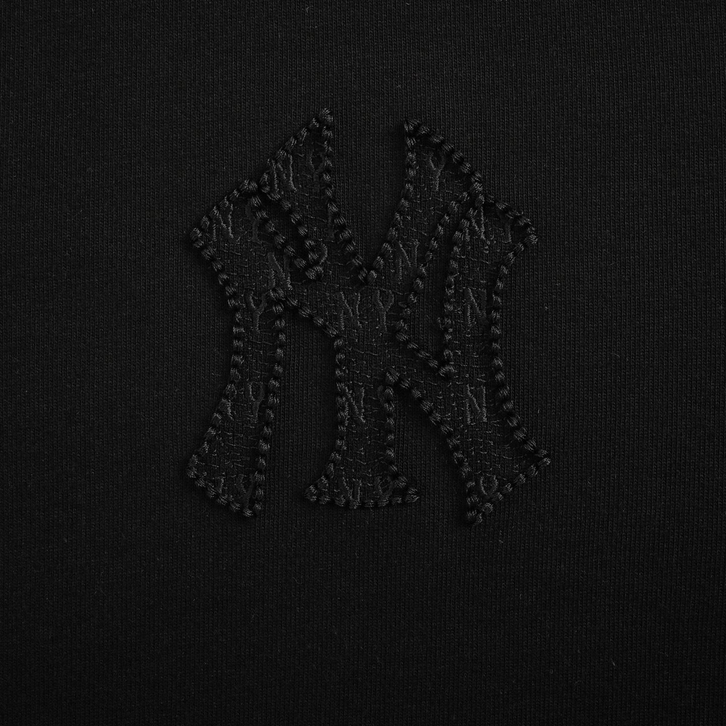 Back embroidered subtle pattern T-shirt