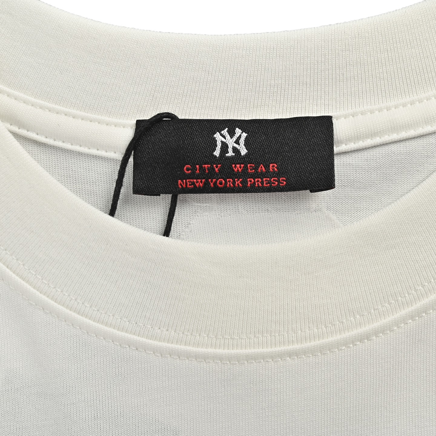 Back embroidered subtle pattern T-shirt