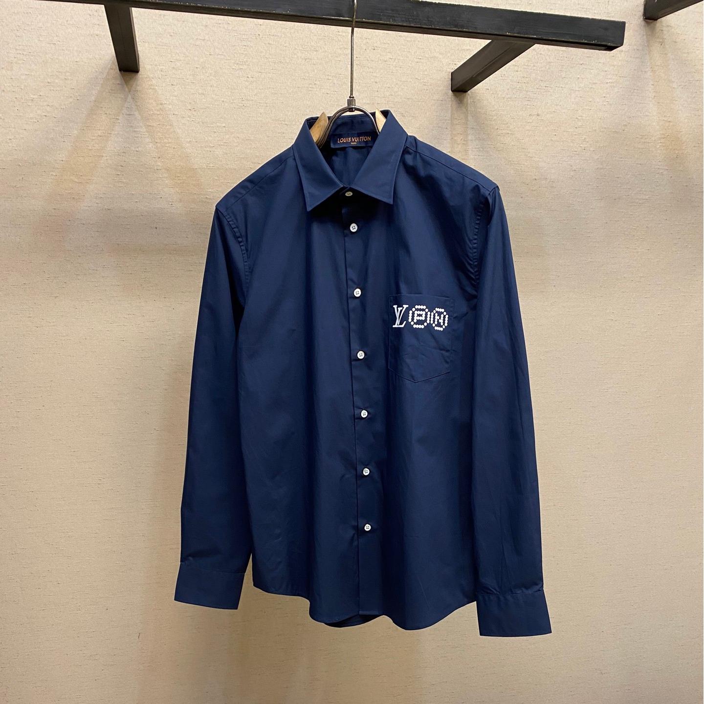 Blue shirt with co-branded signature print