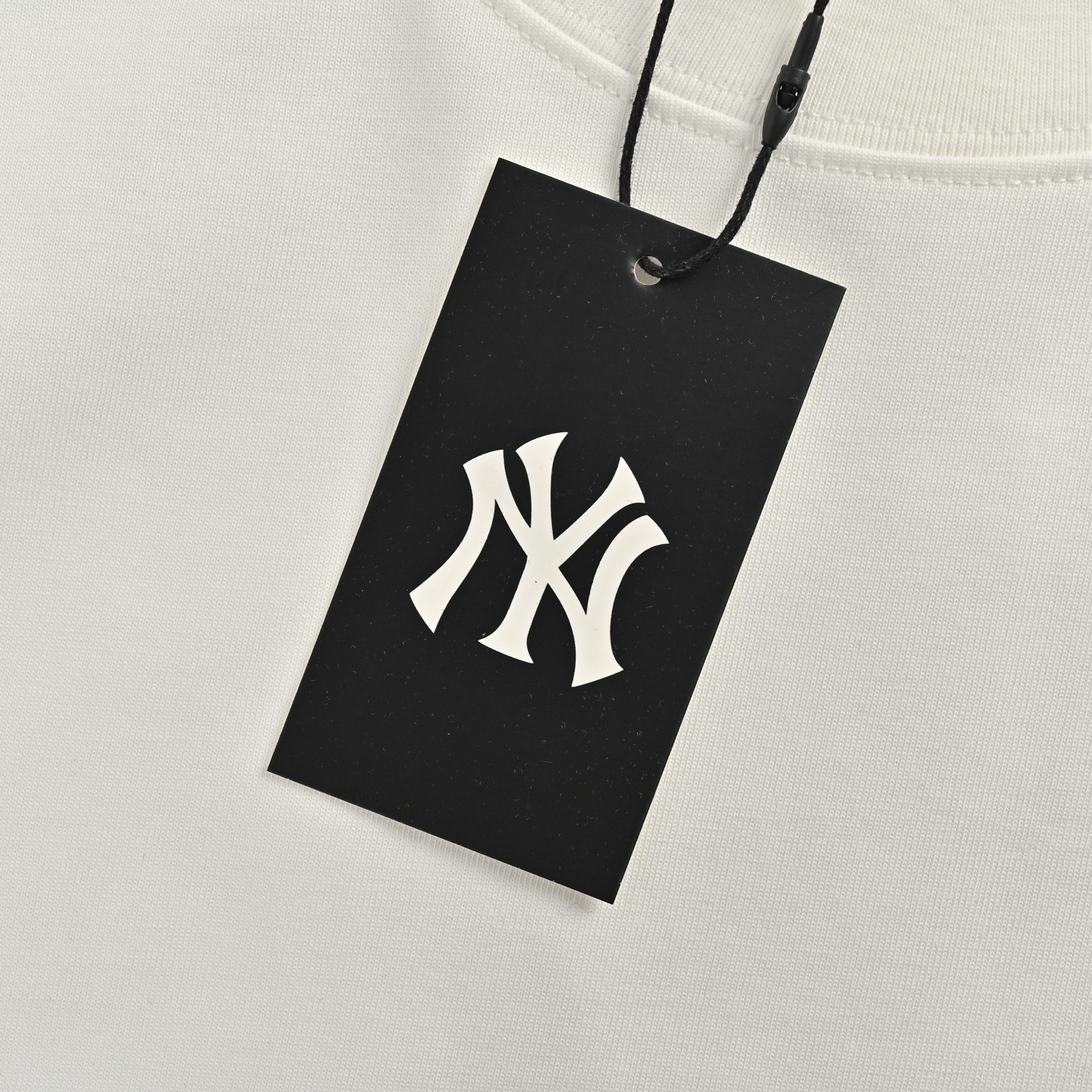 Back embroidered subtle pattern T-shirt