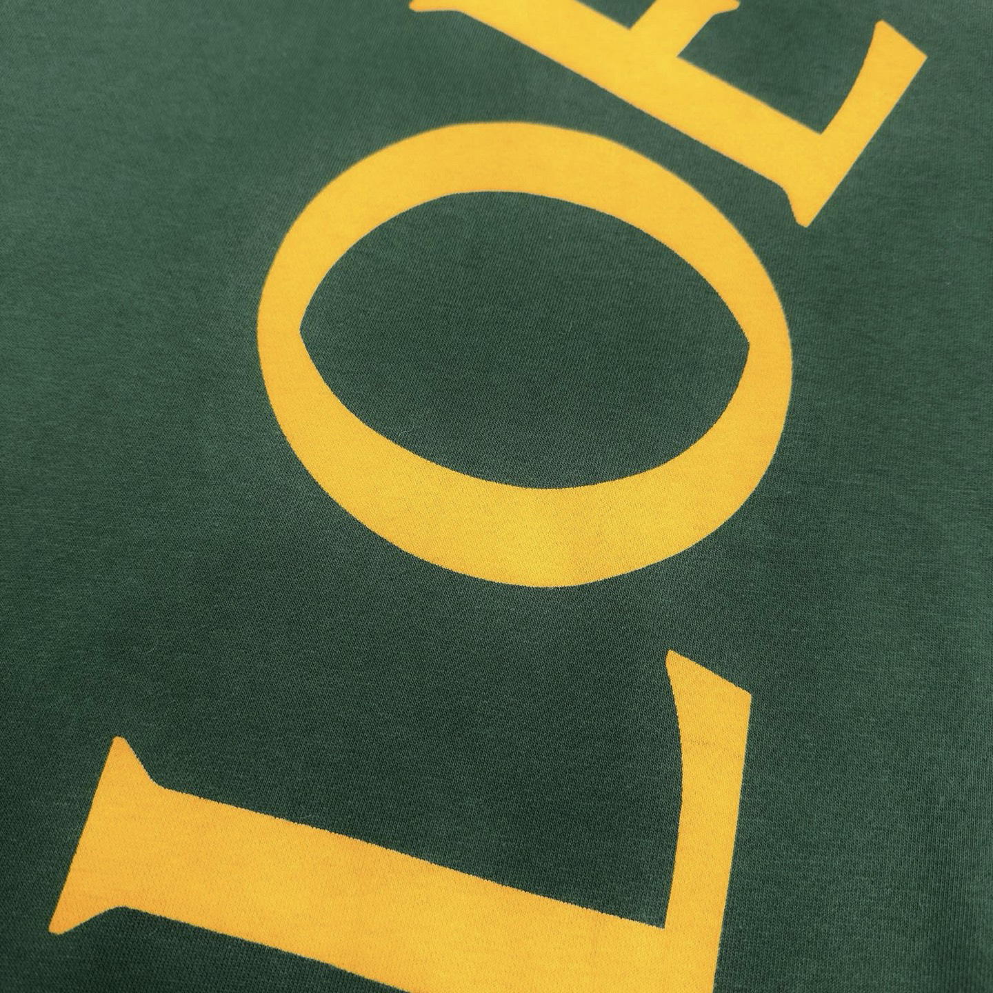 Cross-shoulder letter print hooded sweatshirt