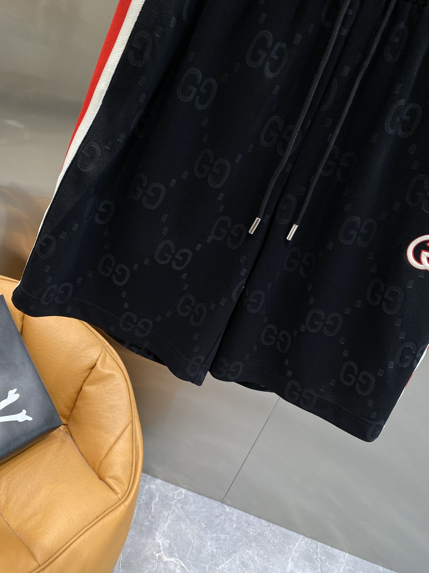 Red and white striped side panel shorts