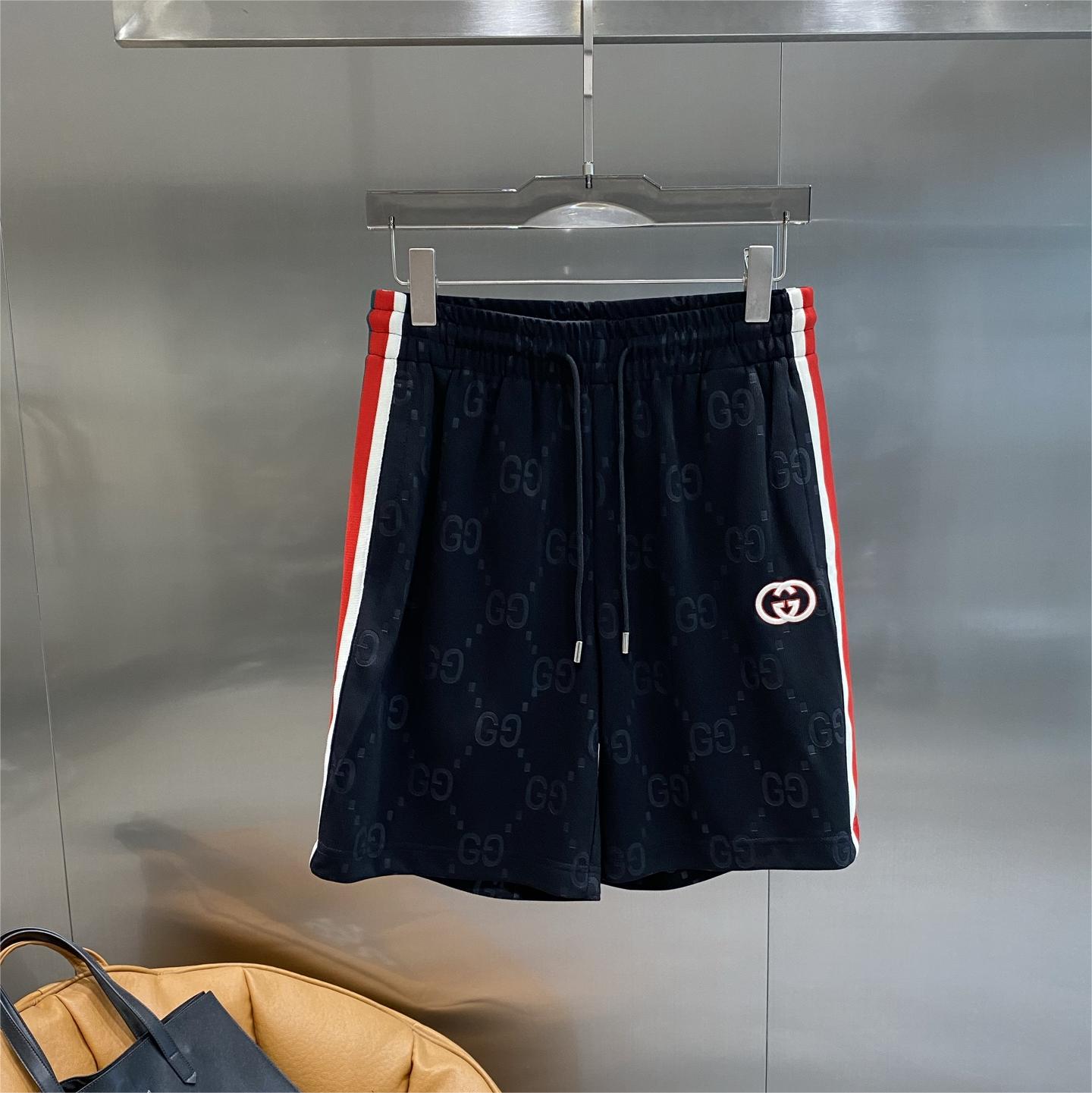 Red and white striped side panel shorts