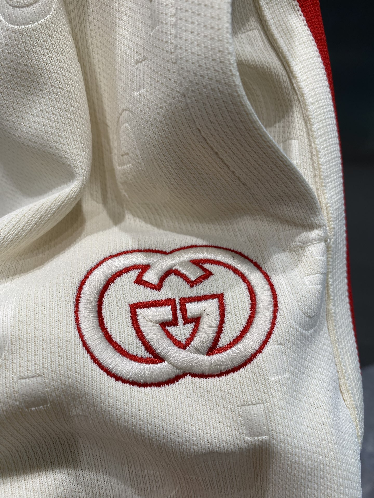 Red and white striped side panel shorts