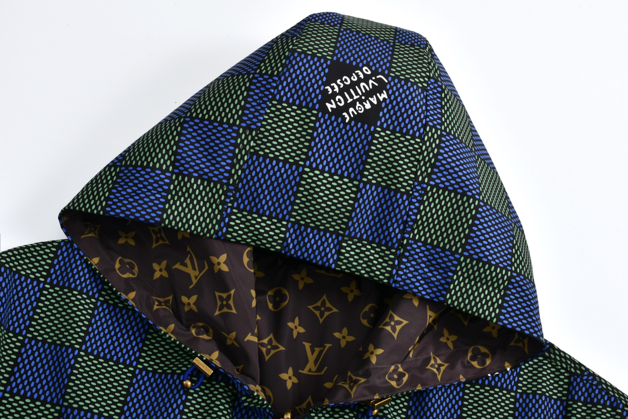 Checkerboard reversible zip-up jacket