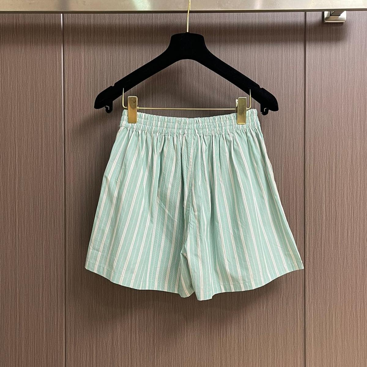 Mint green striped shorts